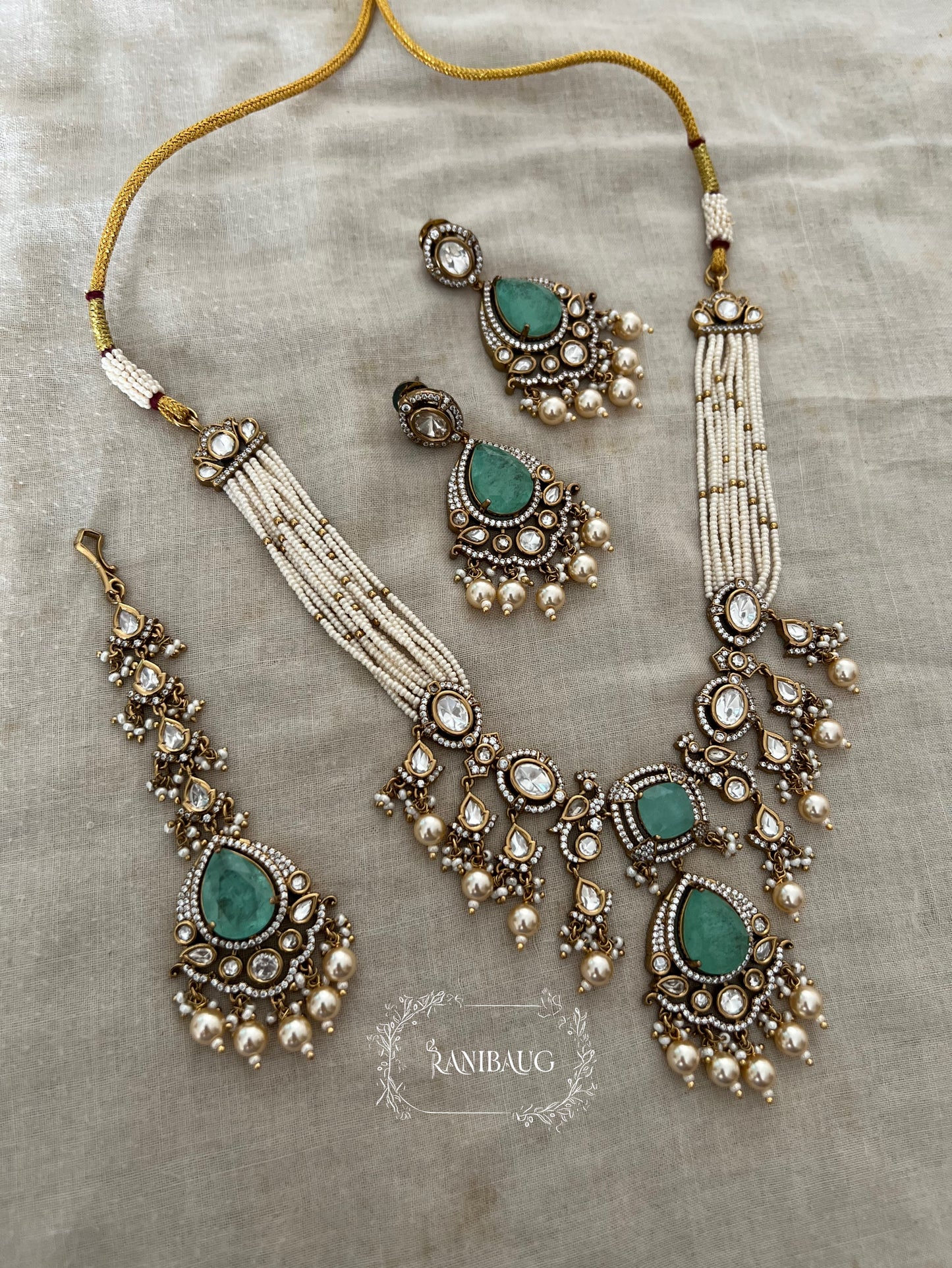 Ramika Polki And Pearl Antique Gold Necklace Featuring Peacock Motif And Mini Pearl Fringes | Wedding Jewellery Set By Ranibaug