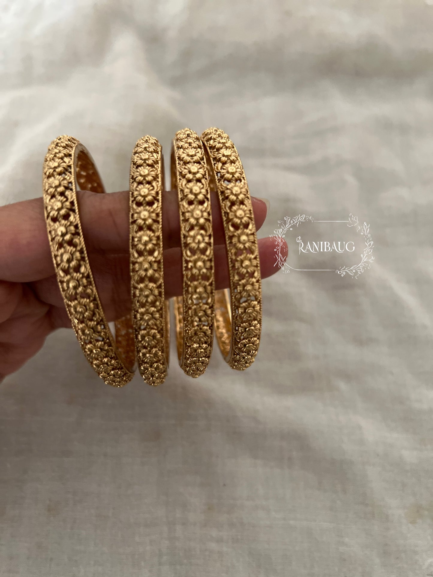 Ranibaug Heritage Floral Texture Gold Bangles (Set Of 4)