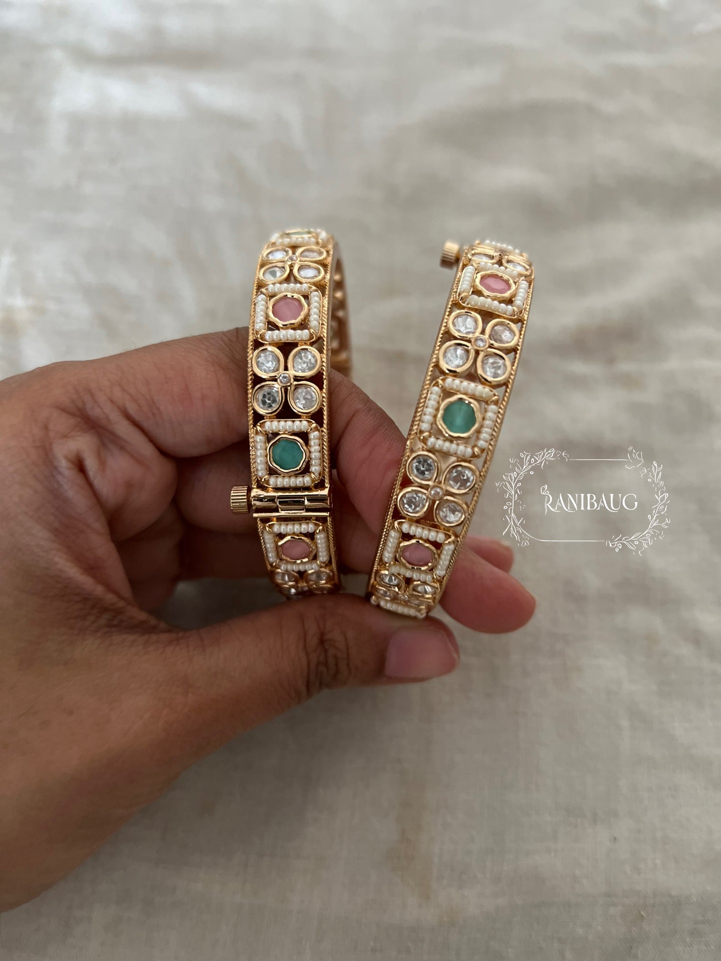 Rashmi White Kundan Motif Multi Color Bangles Set In Rich Gold Finish By Ranibaug