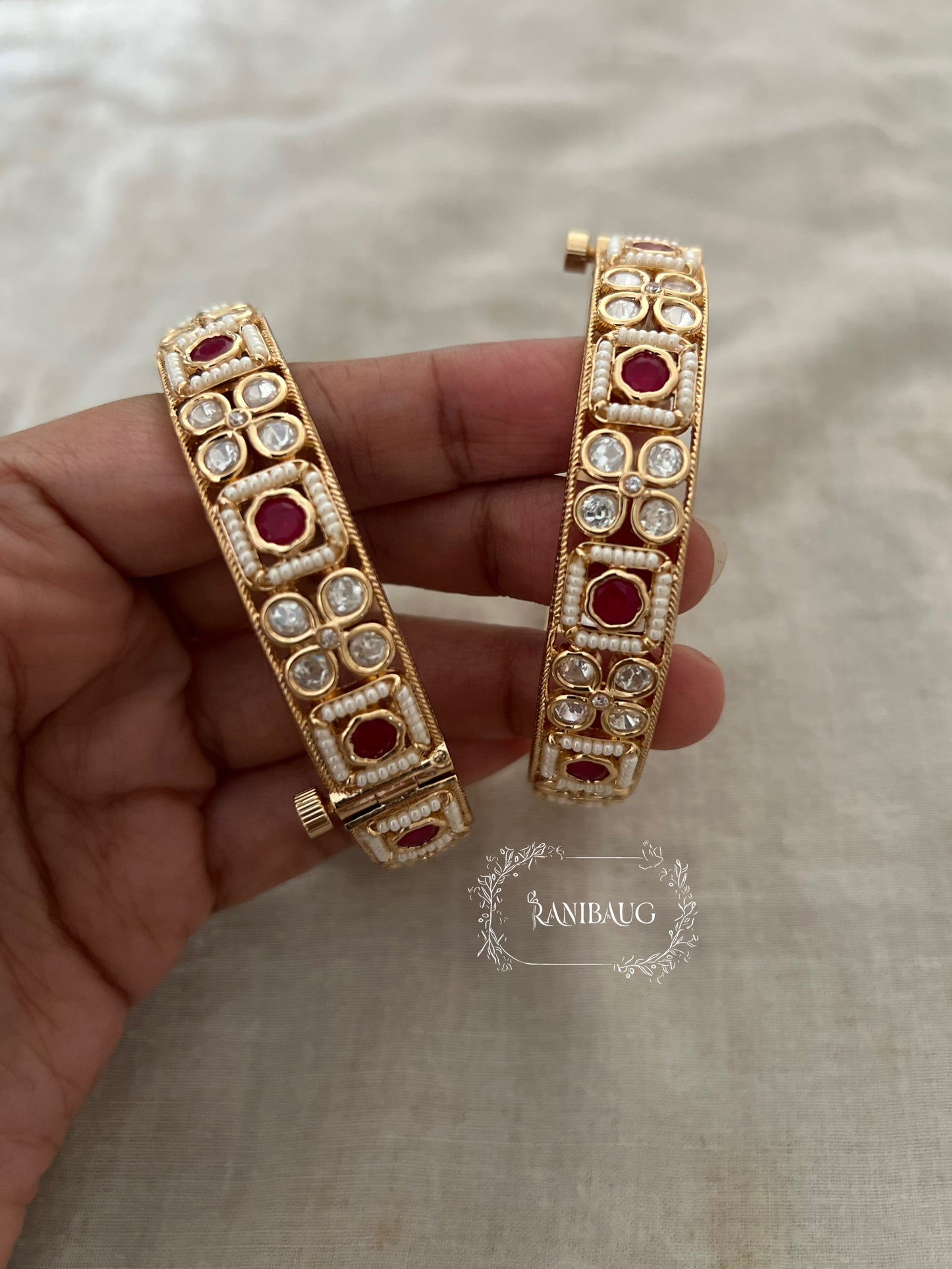 Rashmi White Kundan Motif Multi Color Bangles Set In Rich Gold Finish By Ranibaug