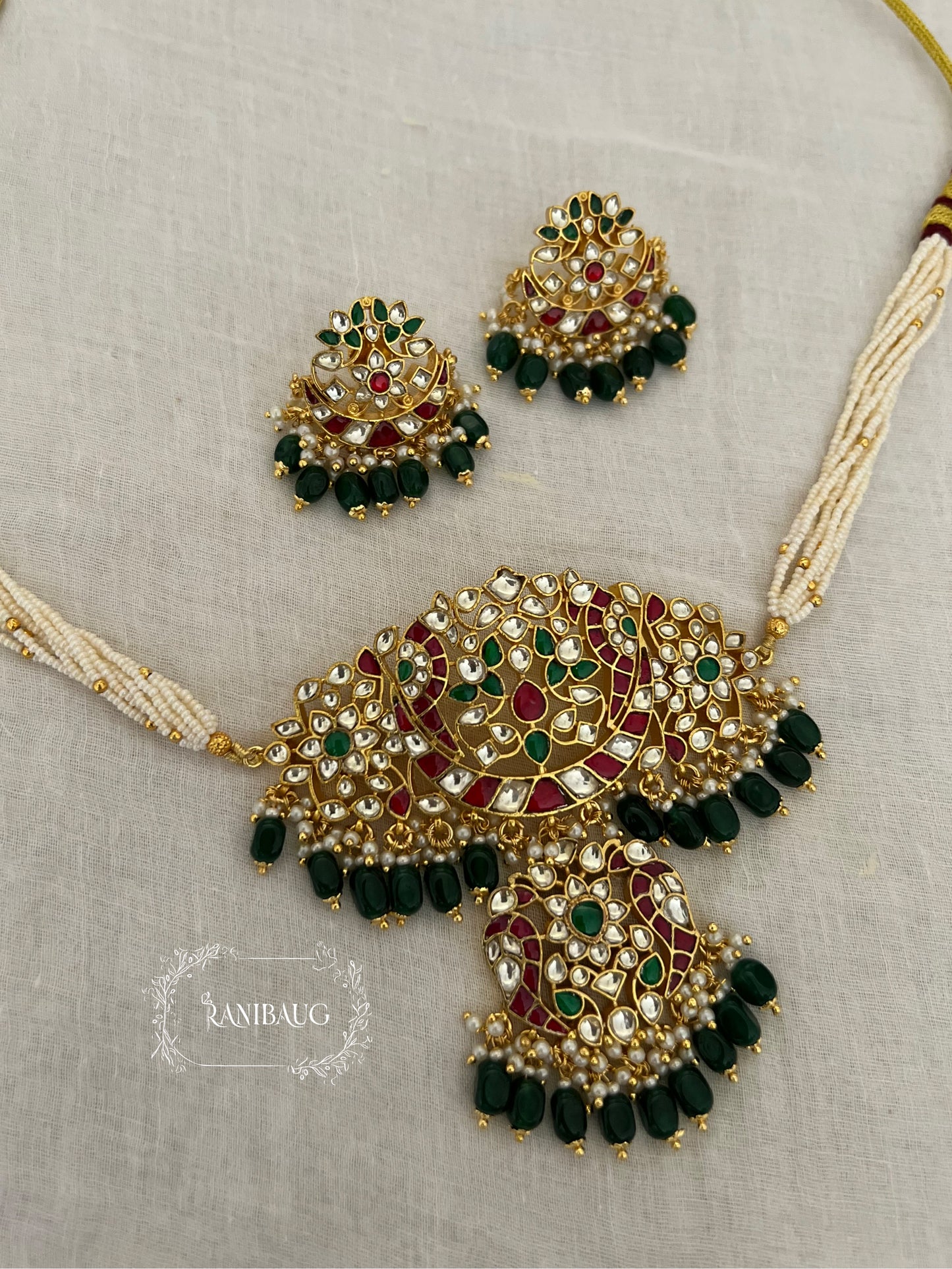 Reet Paachi Kundan Nature Inspired Bird And Floral Motifs In Ruby And Emerald Accents Heritage Choker By Ranibaug