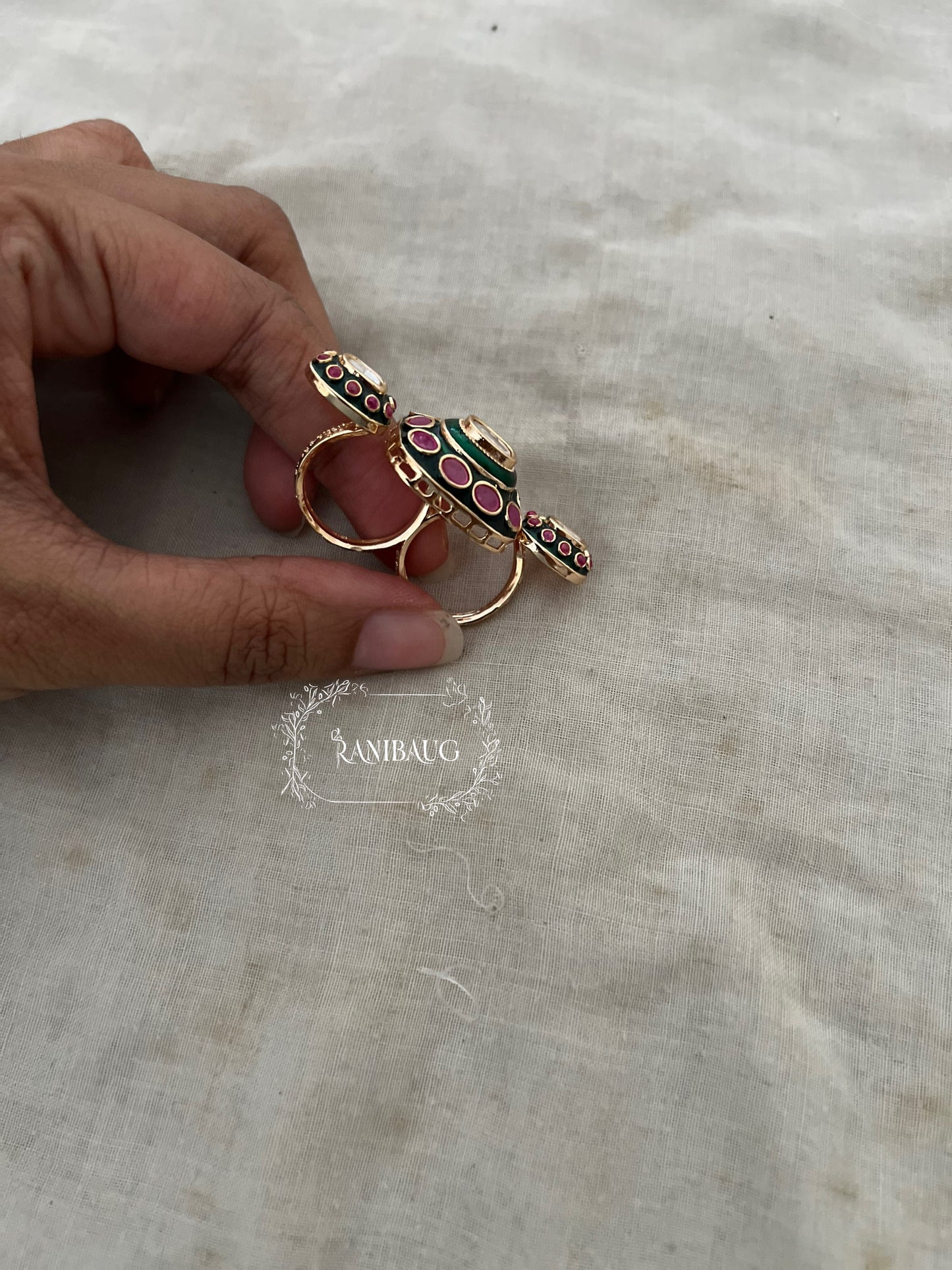 Riddhima Gold Finish Polki Studded Emerald Ruby Enamel Finish Two Finger Ring Jewelry By Ranibaug