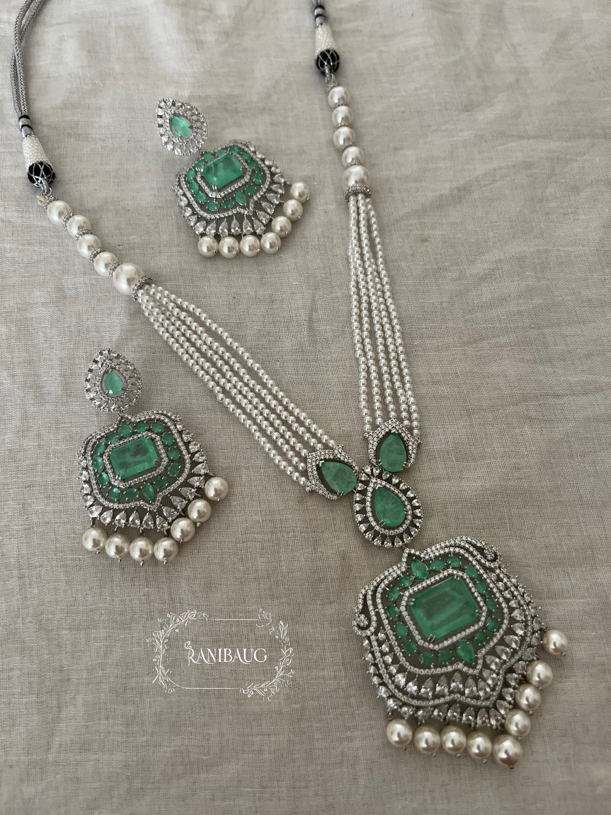 Risha Mint Pearl Adorned Diamond Necklace Set By Ranibaug