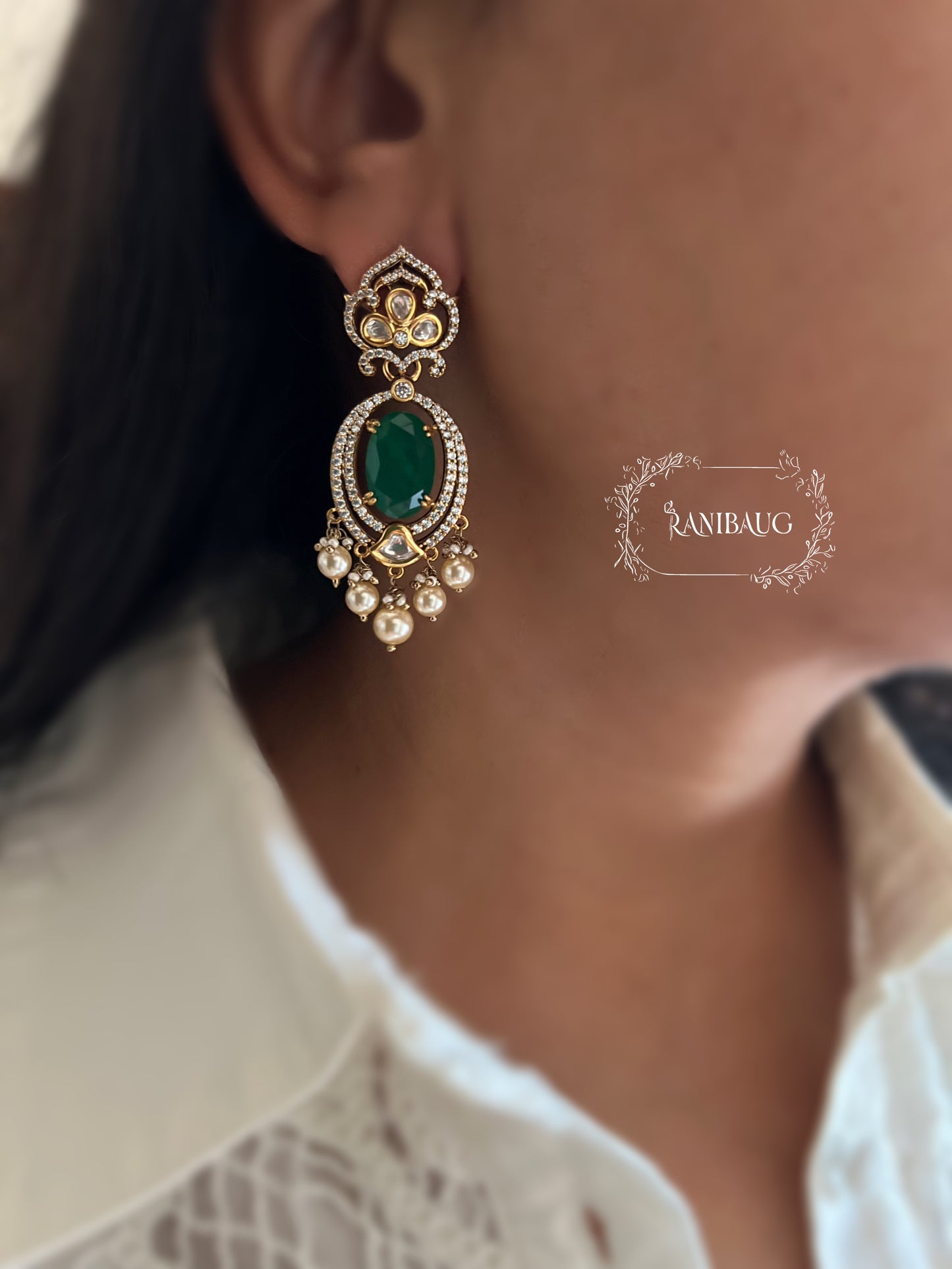 Rishiti Leaf Stud Motif Emerald Green Stone And Pearl Festive Earrings By Ranibaug