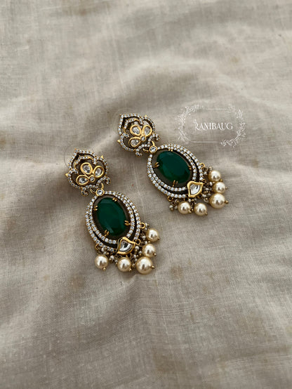 Rishiti Leaf Stud Motif Emerald Green Stone And Pearl Festive Earrings By Ranibaug