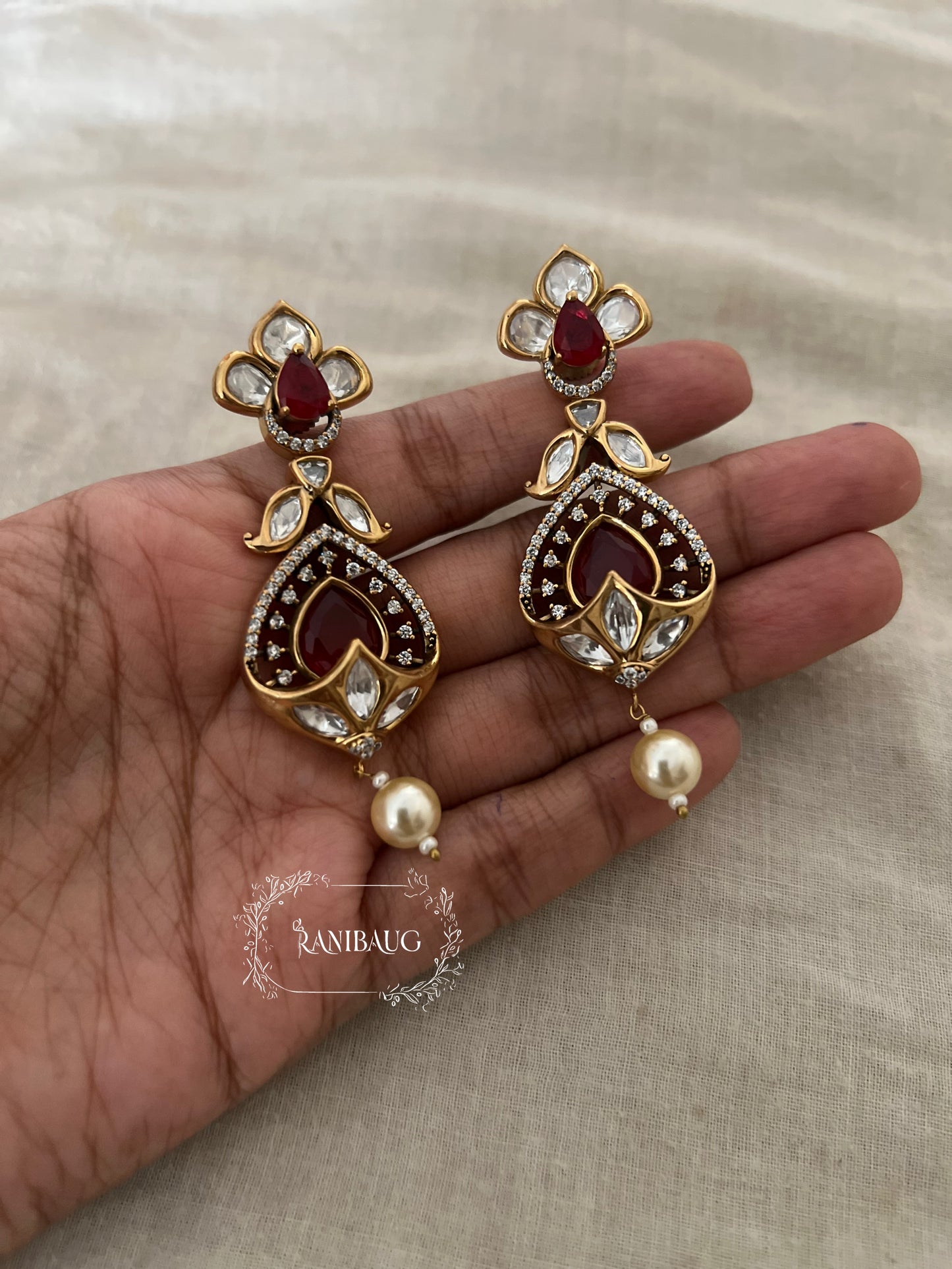 Rishya Regal Pearl Drop Gold Finish Kundan Earrings By Ranibaug