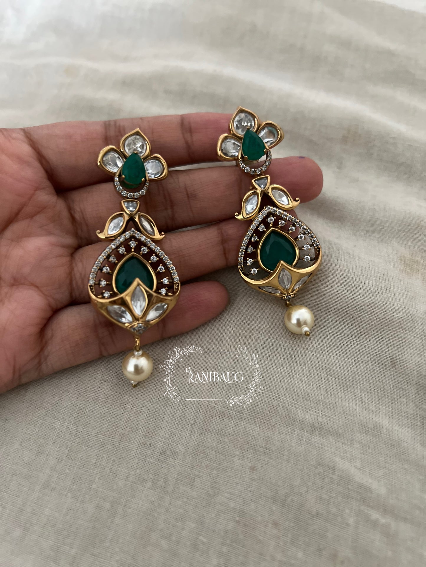 Rishya Regal Pearl Drop Gold Finish Kundan Earrings By Ranibaug