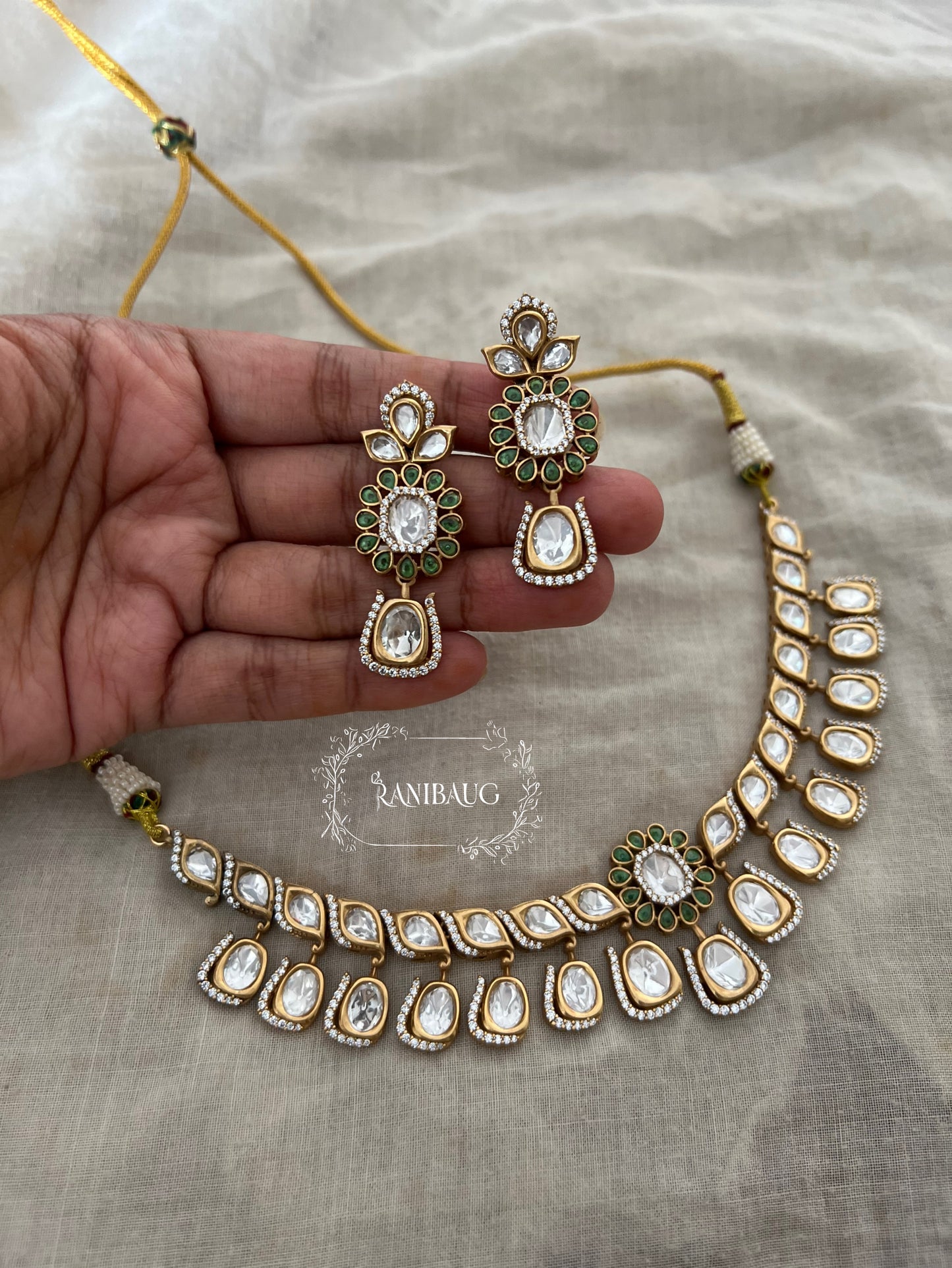 Ritisha Floral Motif Mossainite Polki Studded Lavish Gold Finish Choker Jewellery Set By Ranibaug