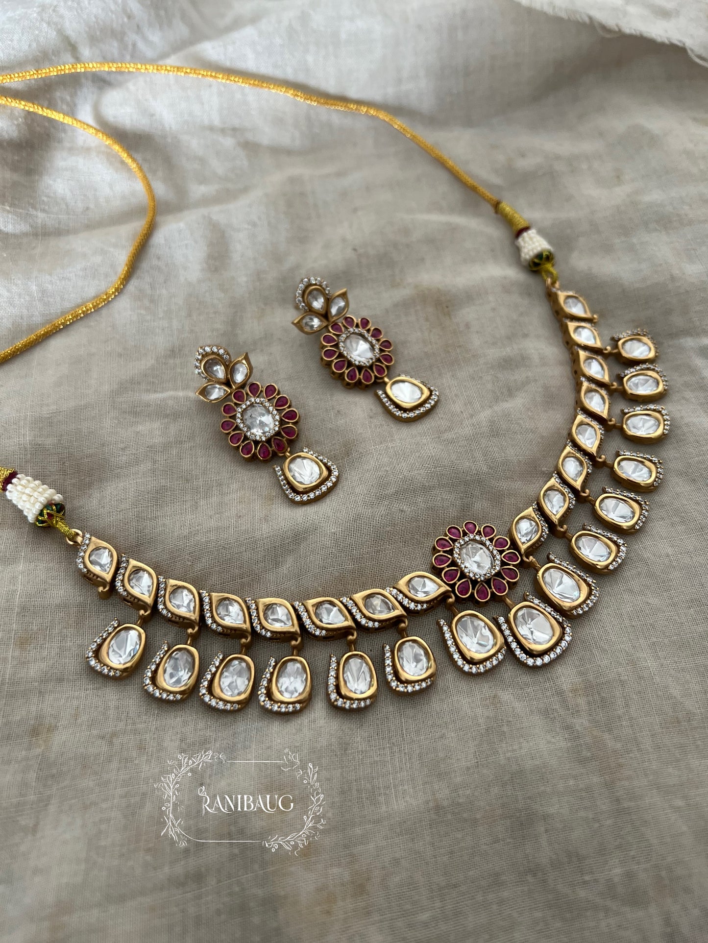Ritisha Floral Motif Mossainite Polki Studded Lavish Gold Finish Choker Jewellery Set By Ranibaug