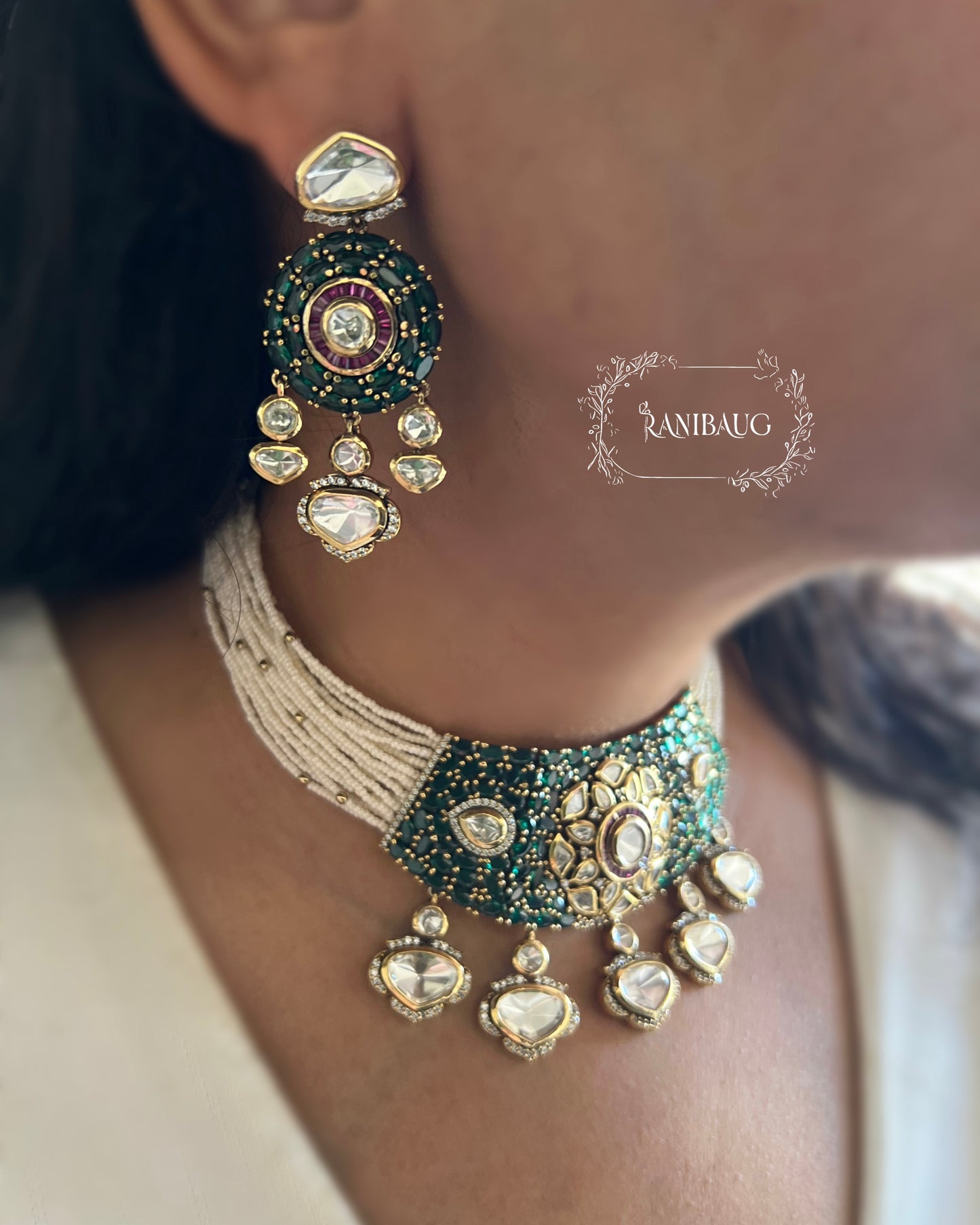 Riva Emerald Stone Polki Floral Motif Kundan Drop Gold Plated Pearl Strand Choker Necklace Set By Ranibaug