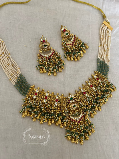 Rushali Royal Gold Finish Pearl Adorned Beaded Paachi Kundan Work Heritage Necklace Set By Ranibaug