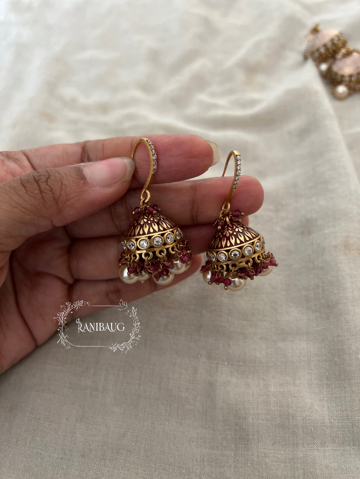 Saachi Antique Gold Dangler Jhumki Earrings With Dangling Pearls And Gold And Color Bead Accents By Ranibaug