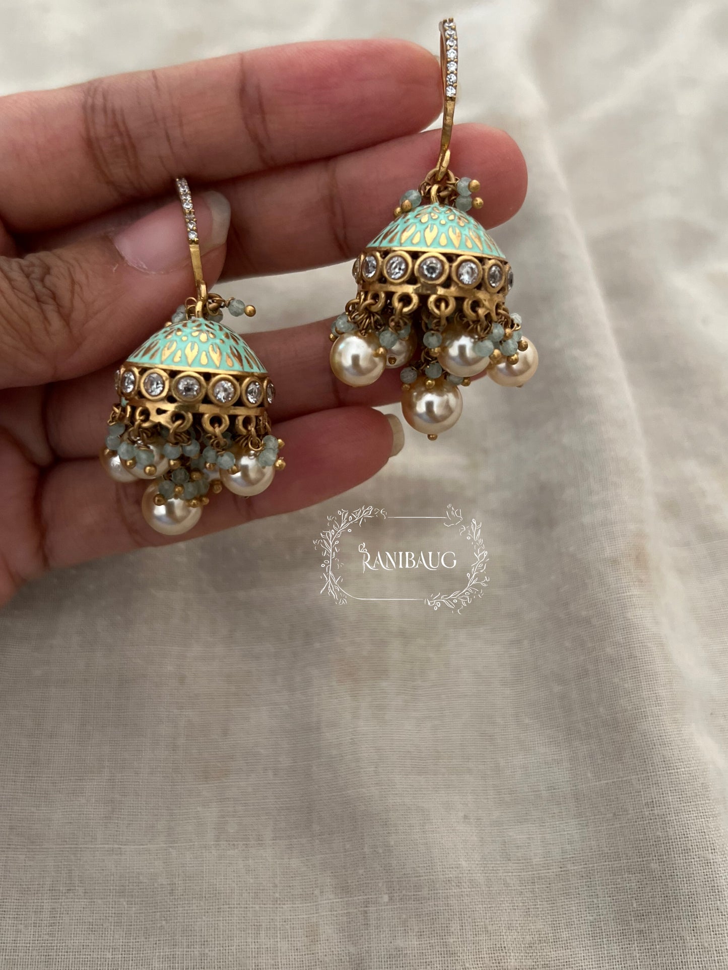 Saachi Antique Gold Dangler Jhumki Earrings With Dangling Pearls And Gold And Color Bead Accents By Ranibaug