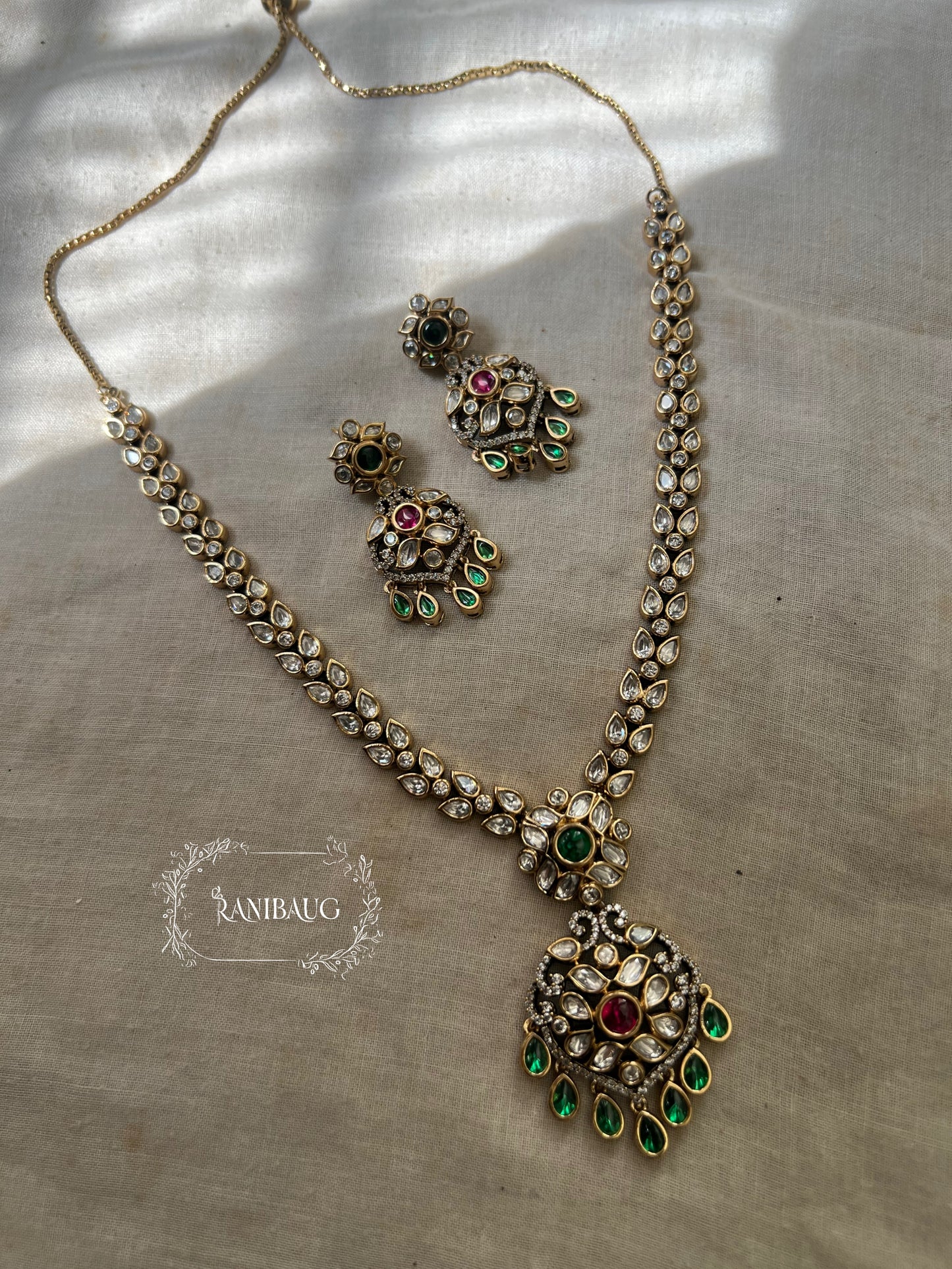 Saisha Royal Charm Victorian Finish Mossainite Jewellery Set By Ranibaug | Long Necklace With Earrings