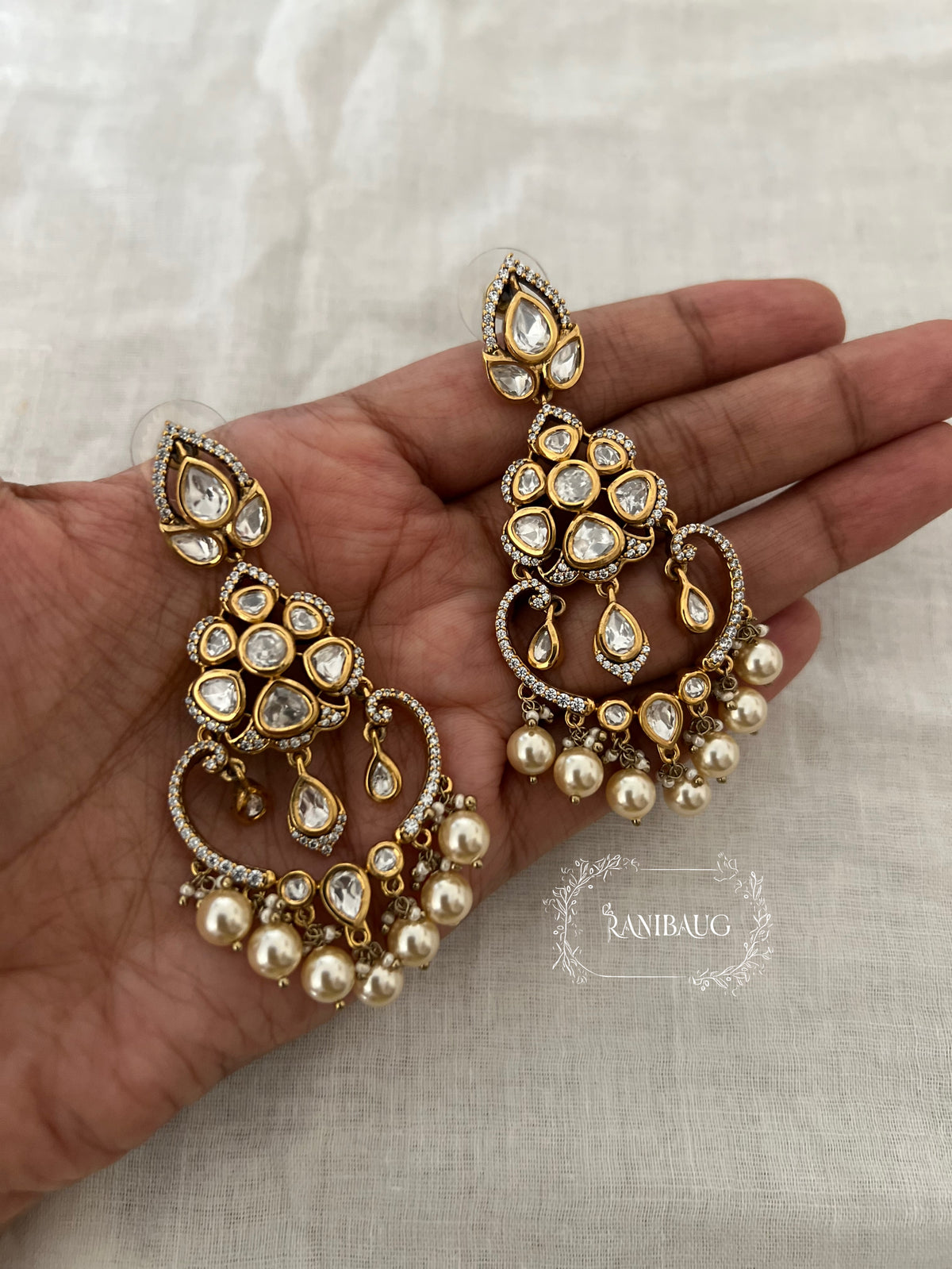 Sakshi Simple Kundan Pearl Gold Finish Festive Pearl Adorned Chandbali By Ranibaug