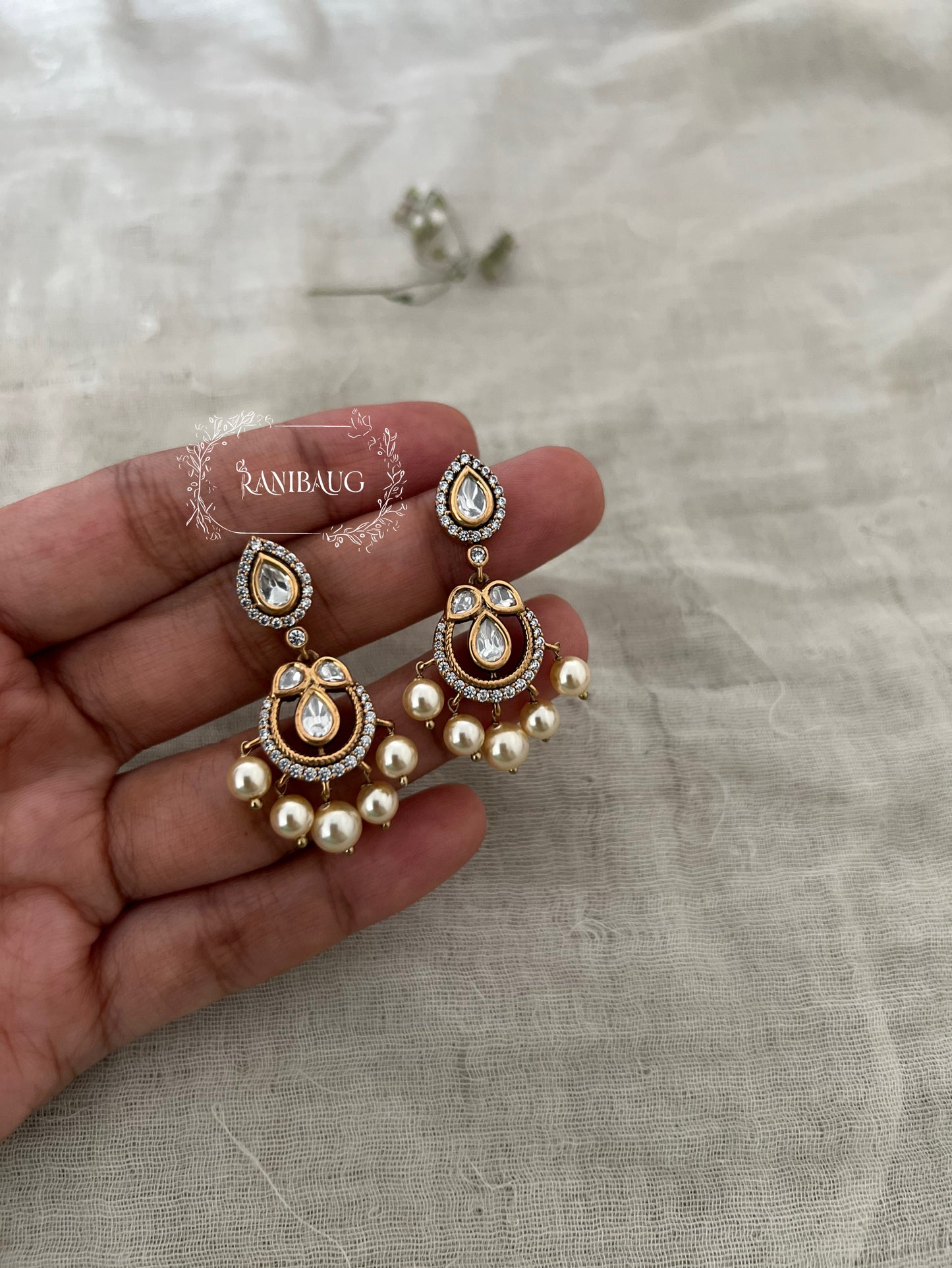 Samridhi Kundan Studded Gold Plated Stud Earrings With Dangling Pearls