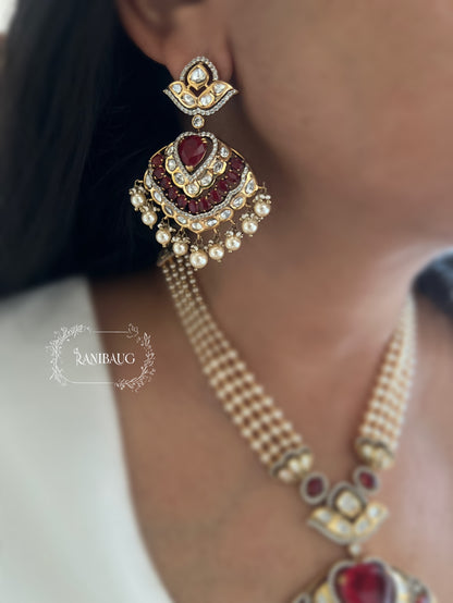 Sangharshi Queen's Heart Deep Red Ruby Adorned Polki Pearl Gold Finish Necklace Set By Ranibaug
