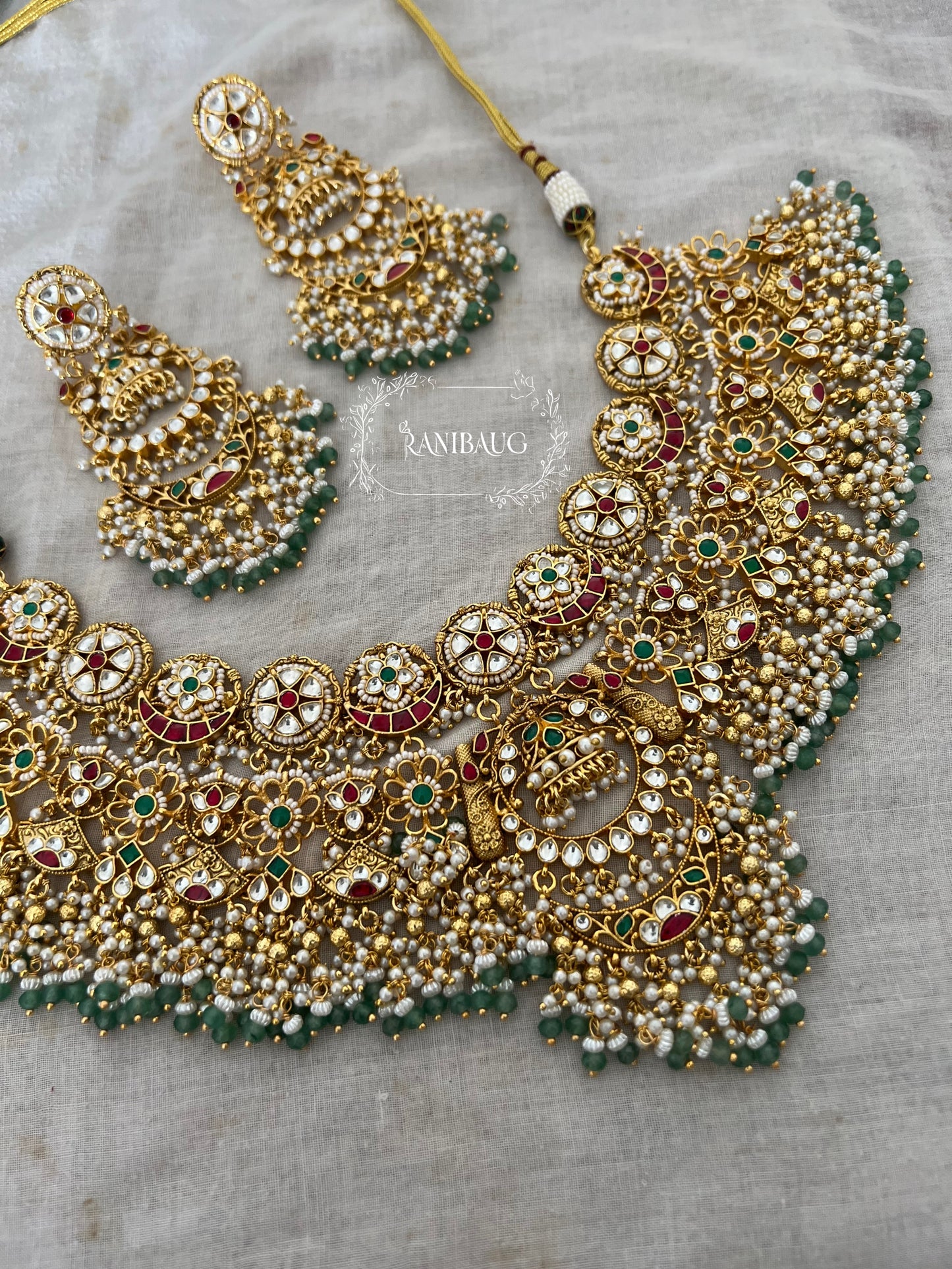 Sanidhya Rich Gold Finish Luminous Floral Cluster Design Pearl And Bead Fringe Heavy Necklae Jewellery Set For Bride By Ranibaug | Heritage Bridal Jewelry