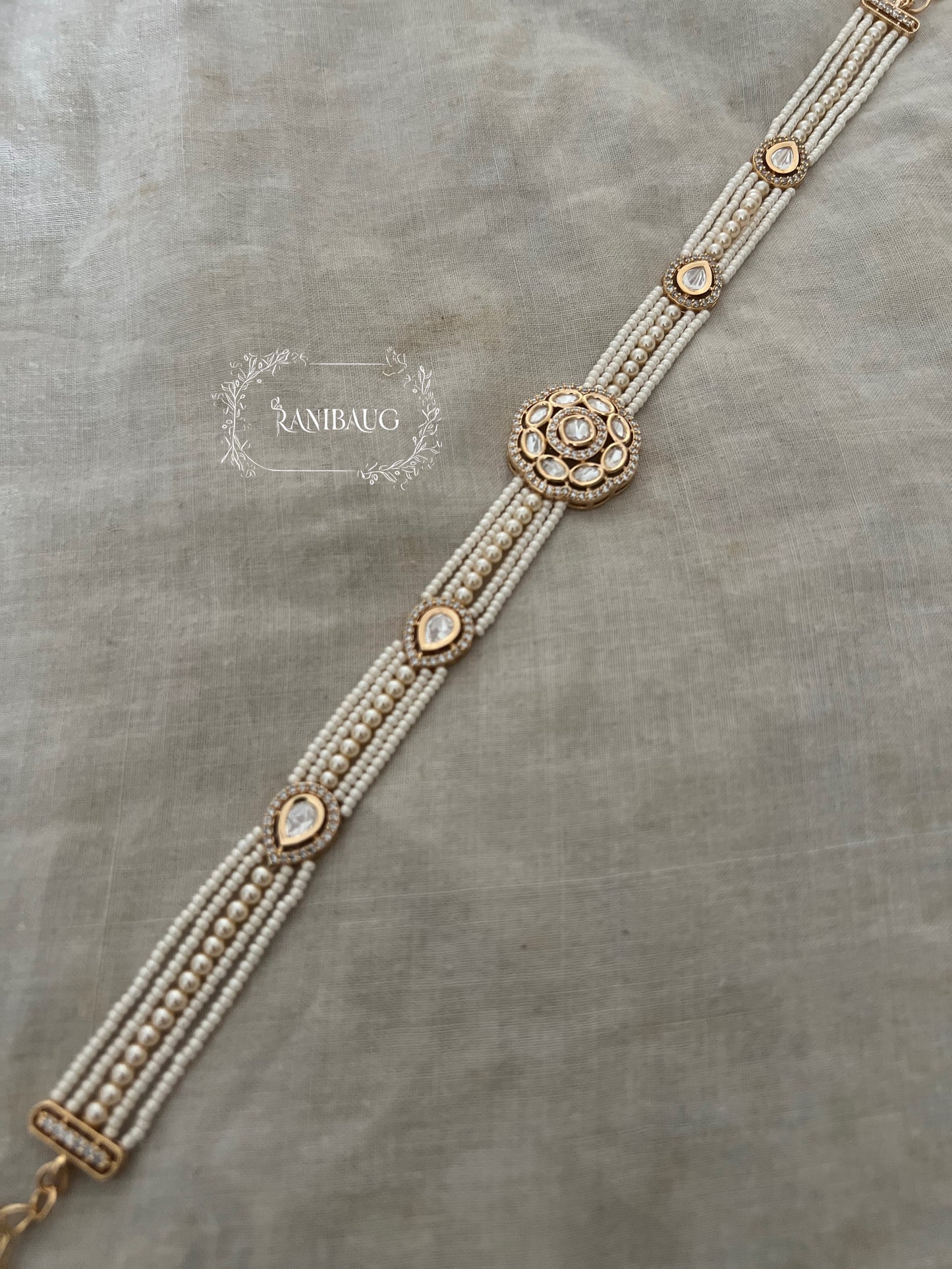 Shakuntala Floral Polki Medallion Sheeshpatti With Pearl Strands & Teardrop Kundan Accents By Ranibaug