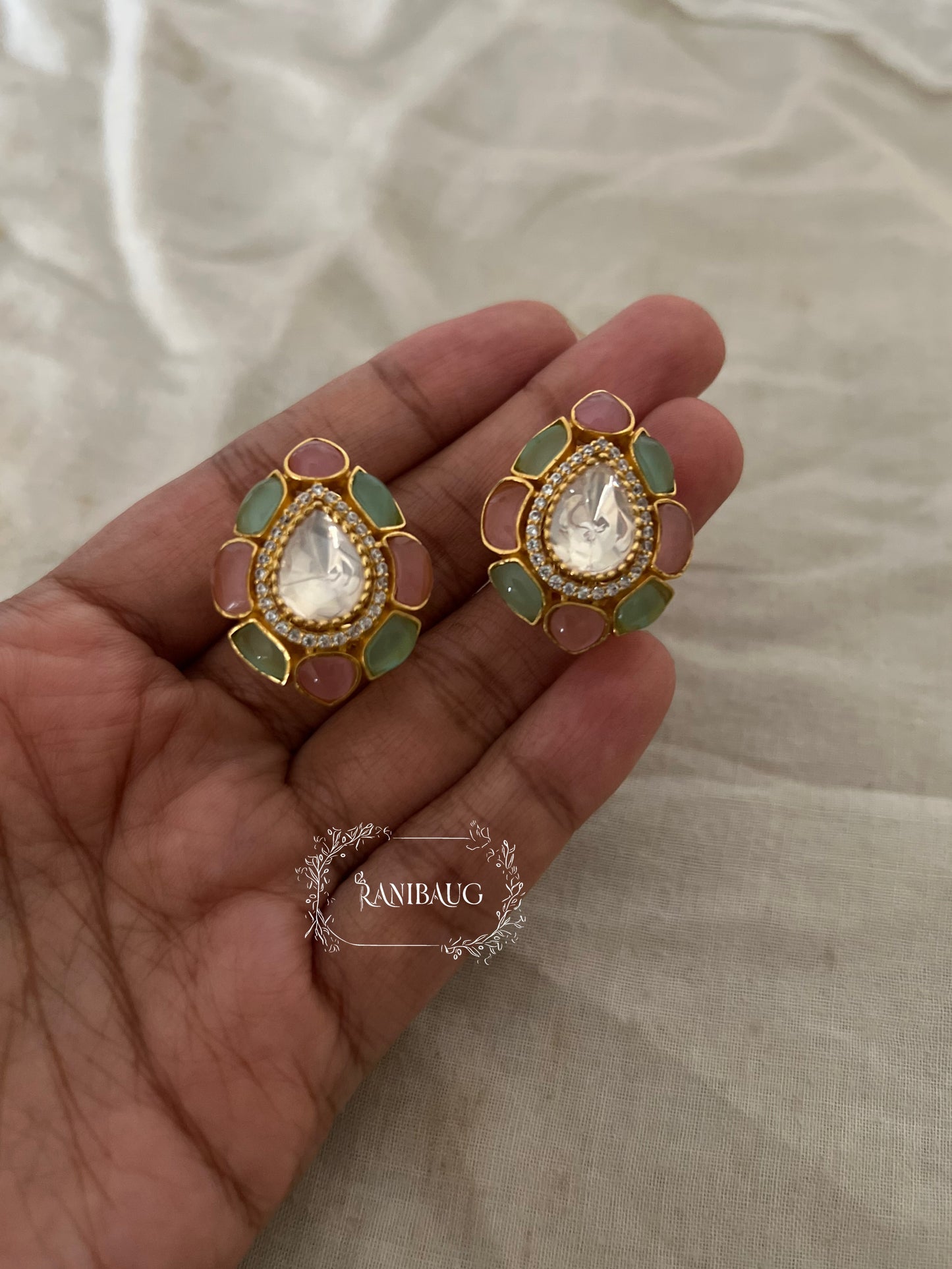 Shalika Pastel Gemstone Polki Studded Gold Finish Teardrop Kundan Ear Studs By Ranibaug
