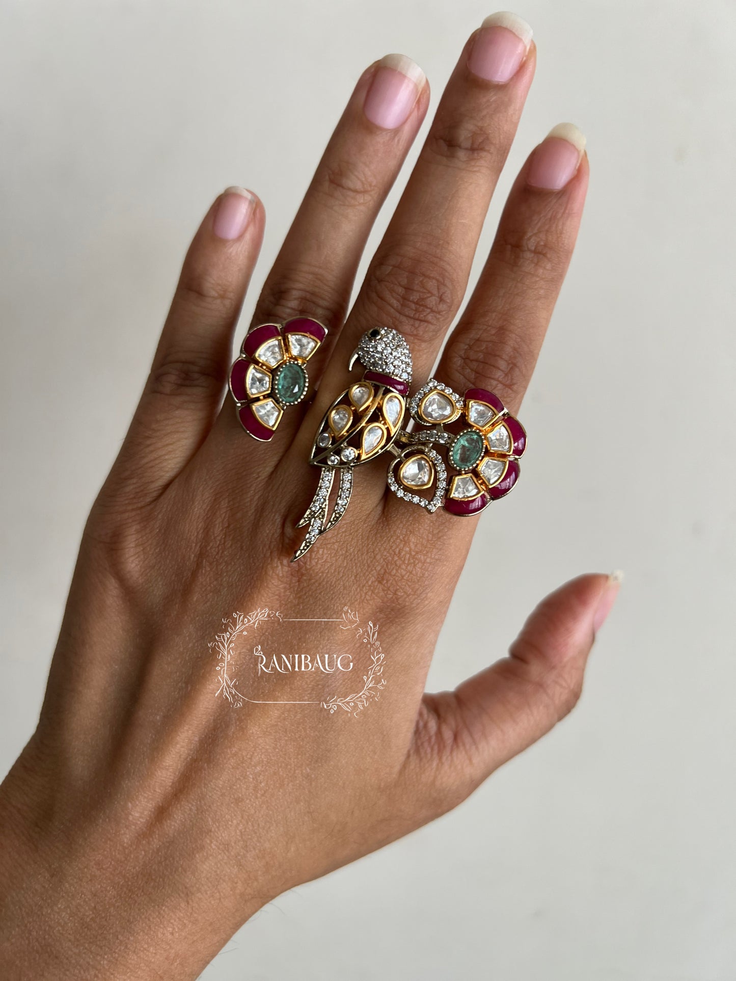 Shanuka Parrot Motif Polki Studded Emerald Ruby Gold Finish Designer Festive Two Finger Ring By Ranibaug