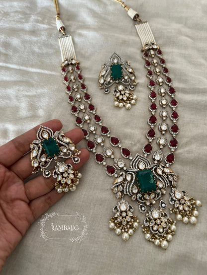 Sharanya Peacock Motif Victorian Finish Polki Kundan Studded Ruby And Emerald Color Long Necklace Set By Ranibaug | 3 Layered Necklace Set
