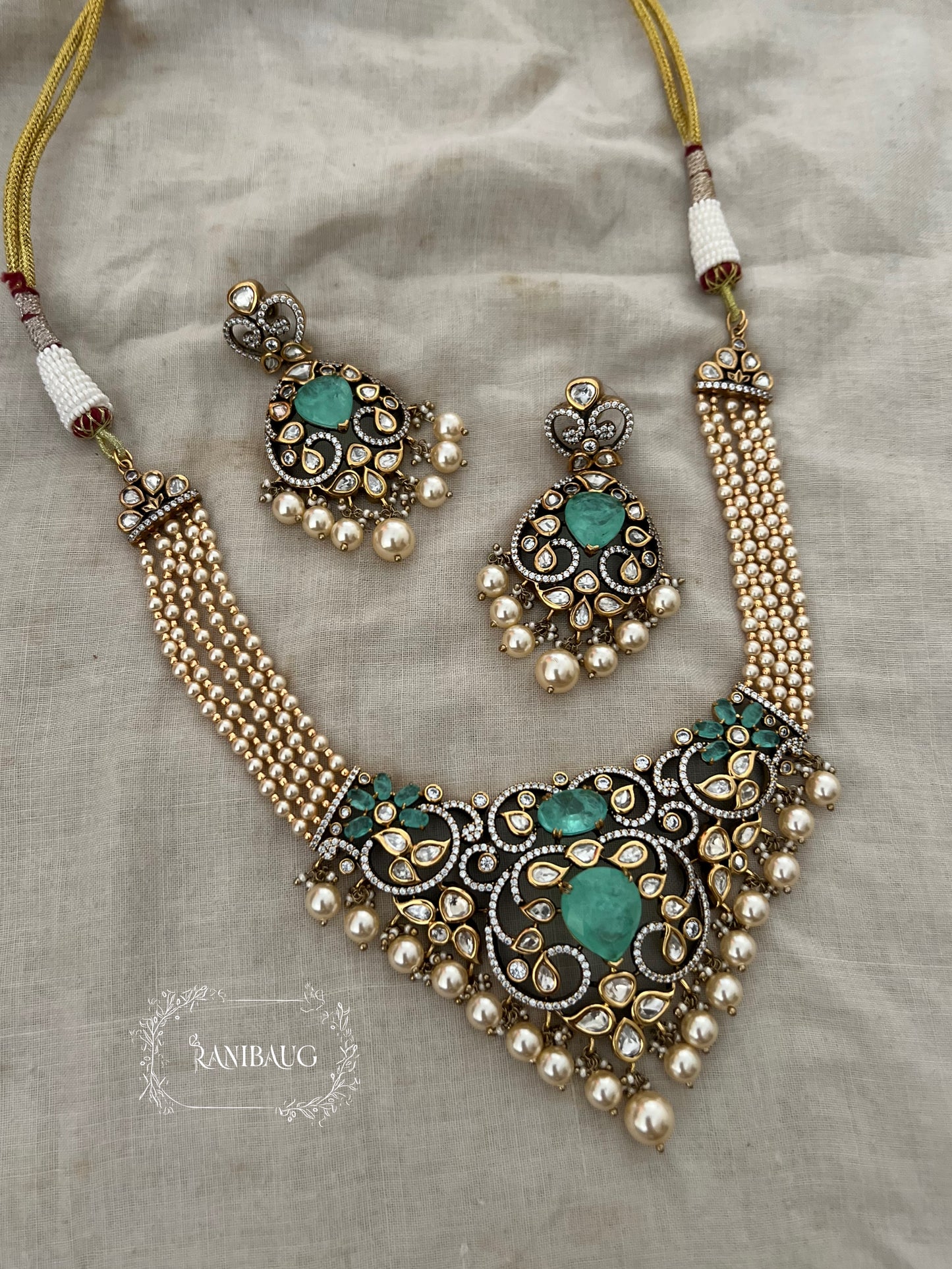 Sharvani Gold Leaf Vines Polki Studded Creamy Pearls Adorned Royal Bespoke Statement Jewellery Set By Ranibaug