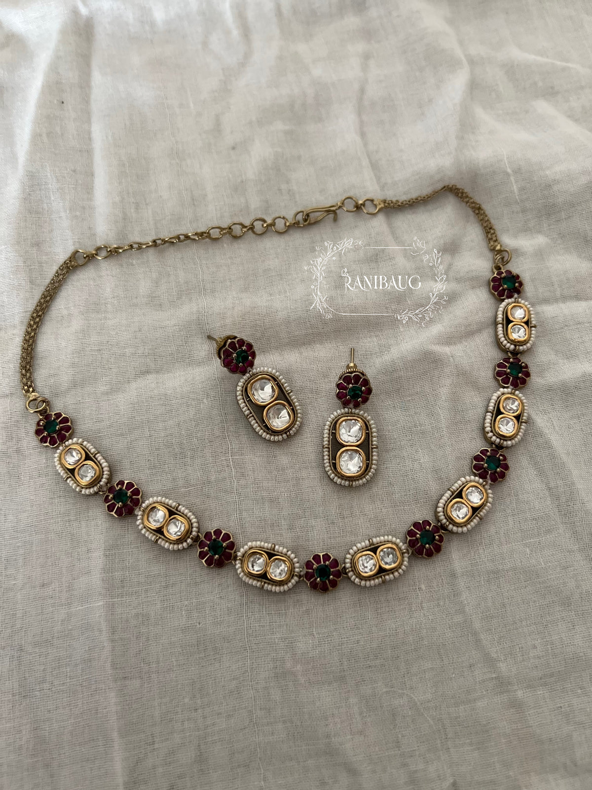 Sharvari Floral Motif Polki Adorned Seed Pearl Classic Necklace Set By Ranibaug