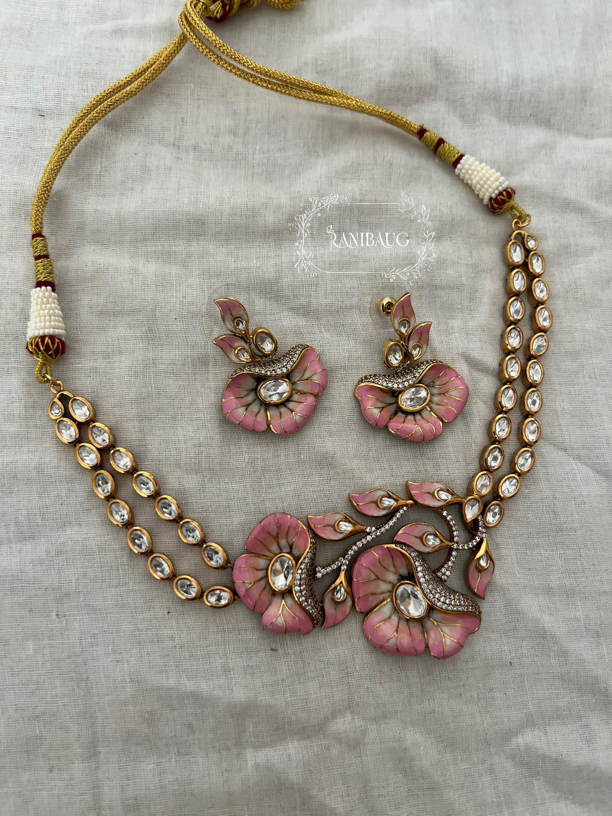 Shreshtha Enamel Floral Motif Polki Adorned Gold Finish Necklace Set By Ranibaug