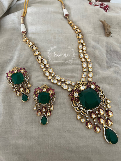 Shreya Bold Long Adjustable Green Emerald And Kundan Necklace Set In Rich Gold Finish By Ranibaug