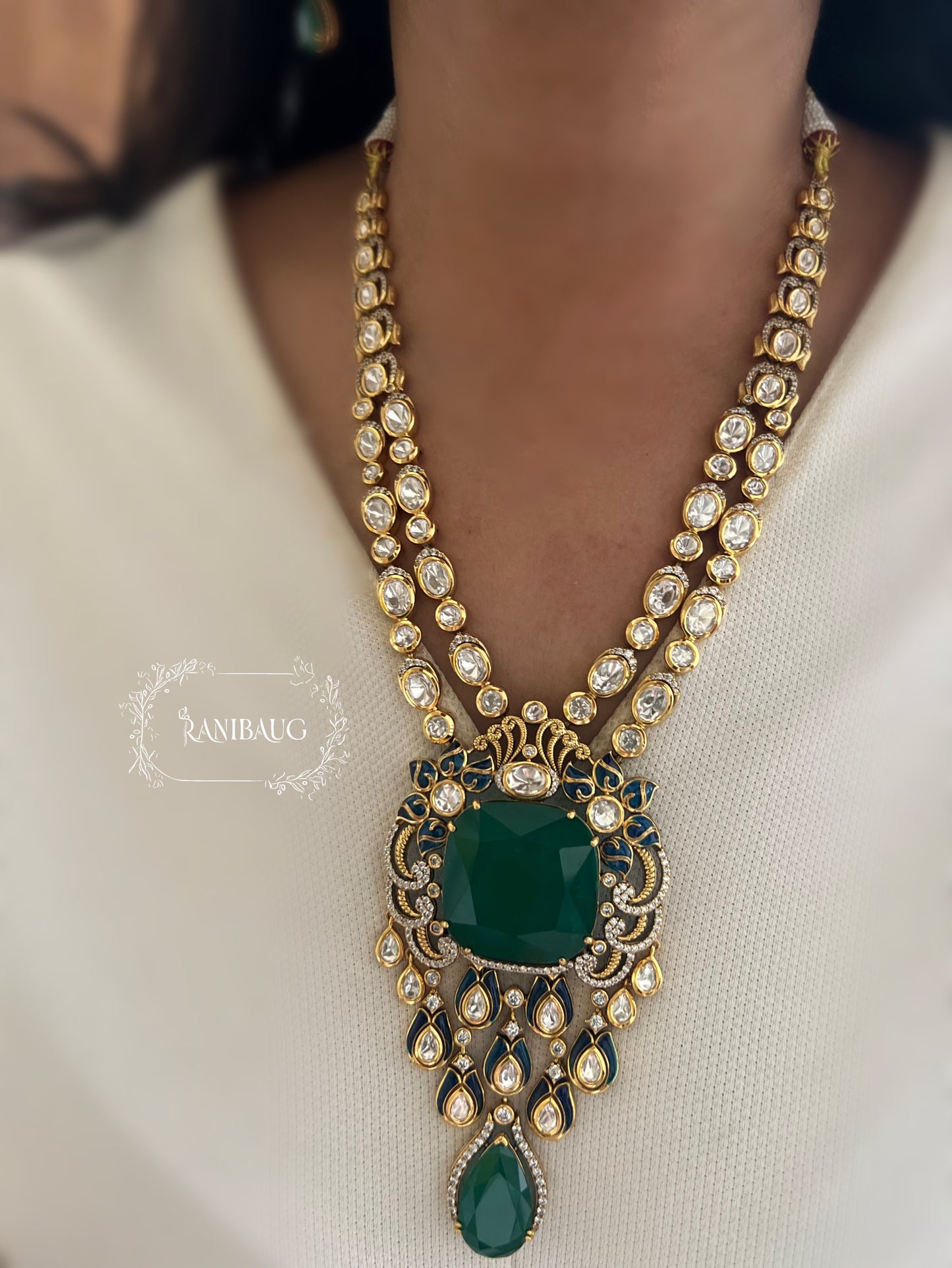 Shreya Bold Long Adjustable Green Emerald And Kundan Necklace Set In Rich Gold Finish By Ranibaug