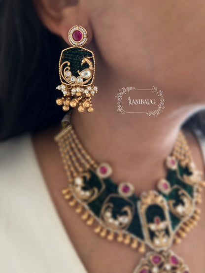 Shyama Gold Finish Peacock Motif Deep Green And Ruby Adorned Polki Heritage Jewellery Set By Ranibaug