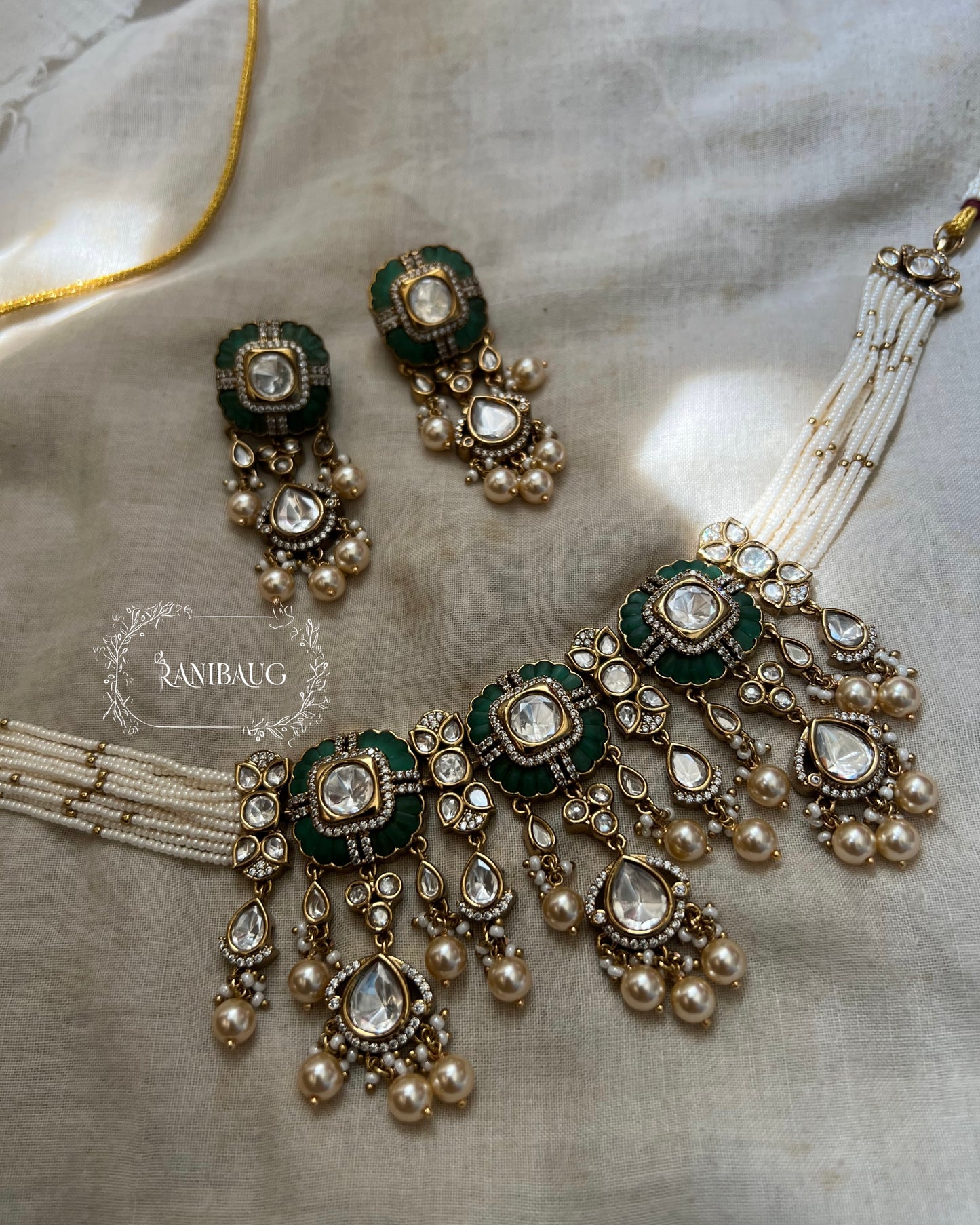 Sichiya Mossainite Polki Studded Gold Finish Creamy Pearls Adorned Beaded Strand Necklace Choker Set By Ranibaug