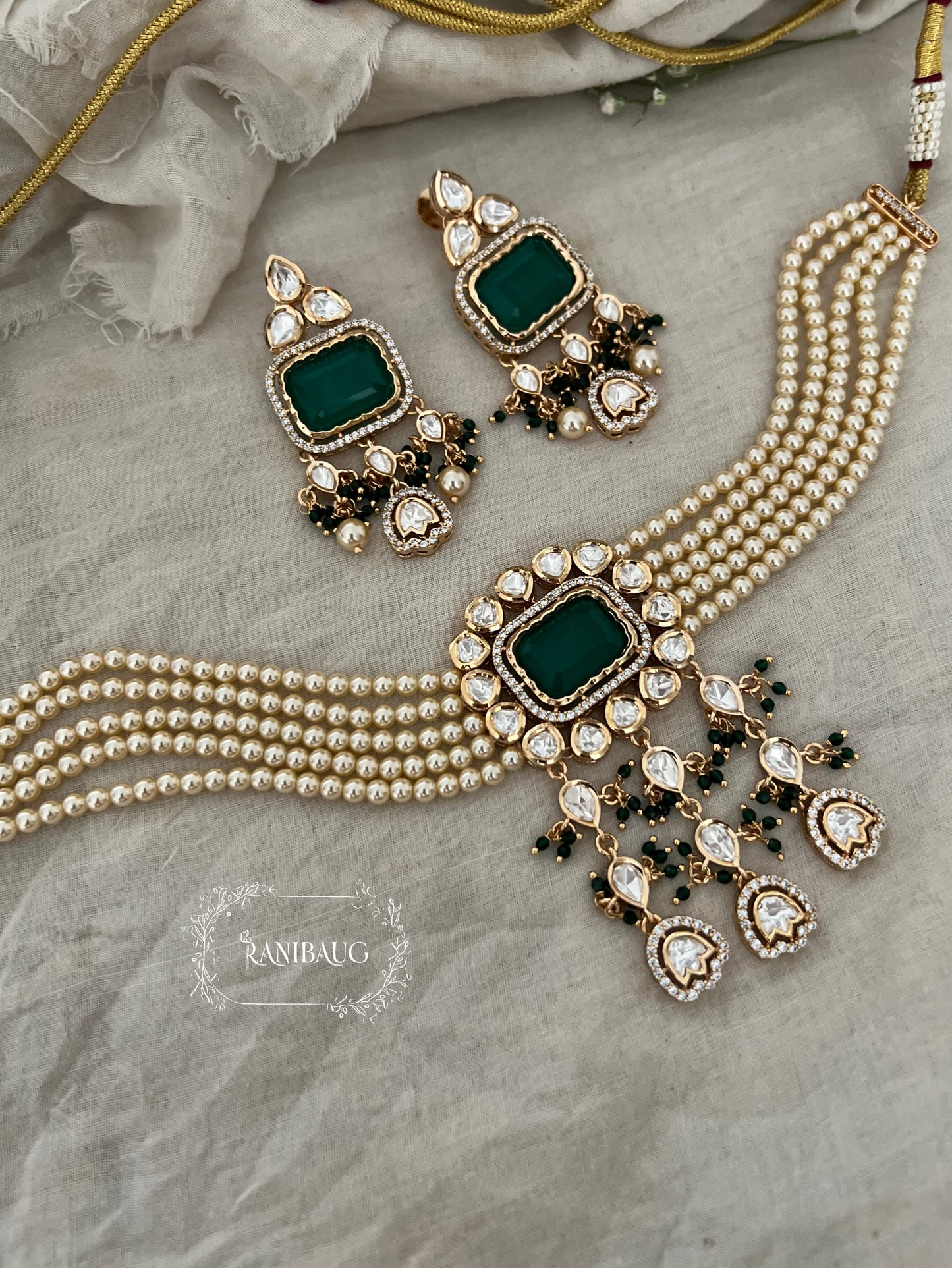 Siddhi Gold Plated Polki And Pearl Choker Set With Rectangle Gemstone Motif And Contrasting Bead Accents By Ranibaug