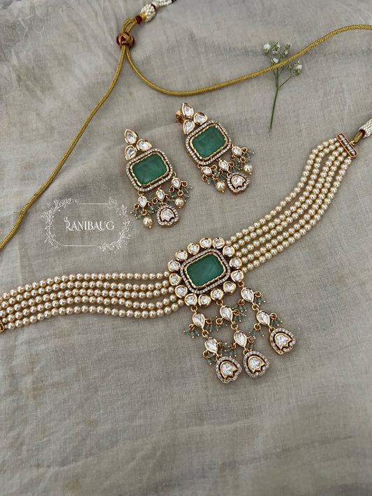 Siddhi Gold Plated Polki And Pearl Choker Set With Rectangle Gemstone Motif And Contrasting Bead Accents By Ranibaug