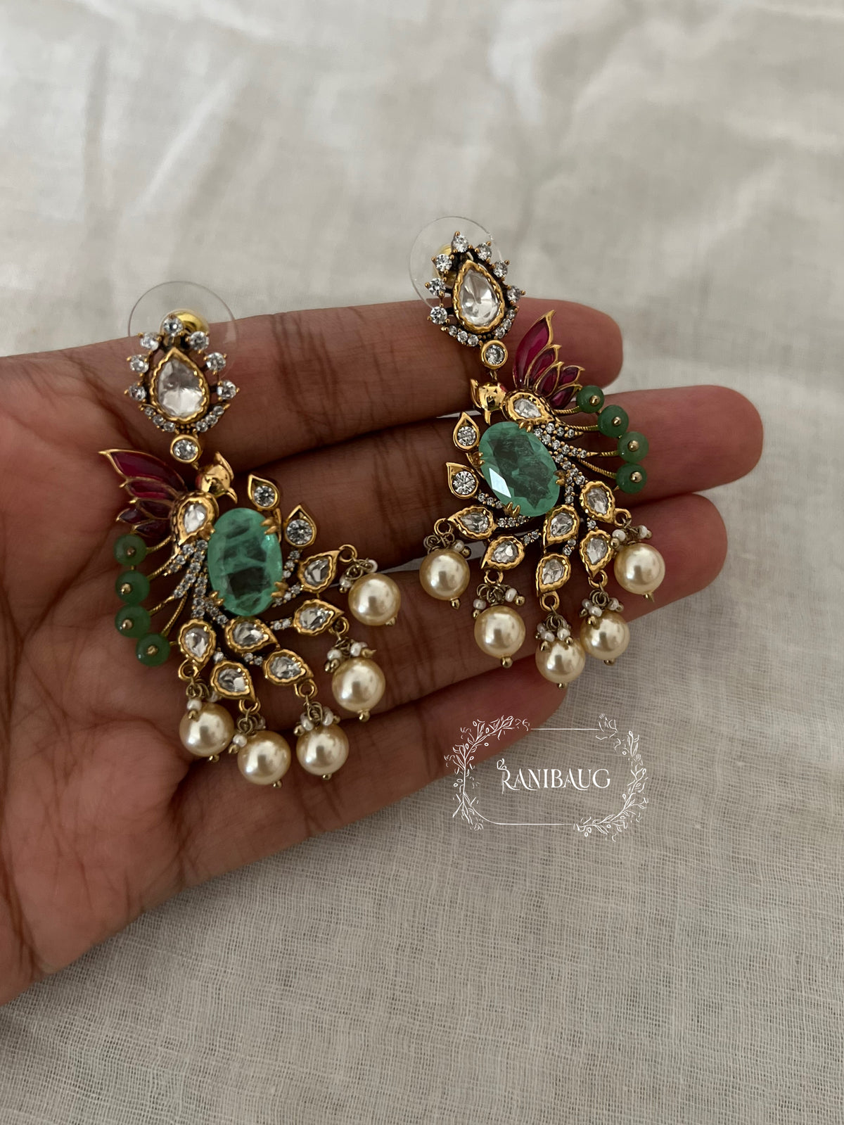 Smiti Emerald Polki Gold Finish Pearl Adorned Bird Motif Festive Earrings Jewelry By Ranibaug