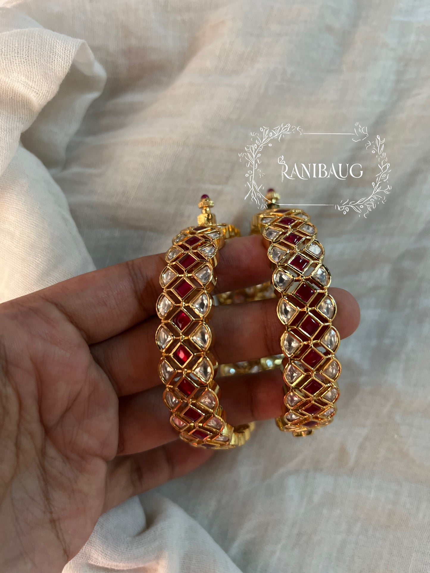 Sukriti South Indian Bangle In Ruby Red Accents And Premium Gold Finish By Ranibaug