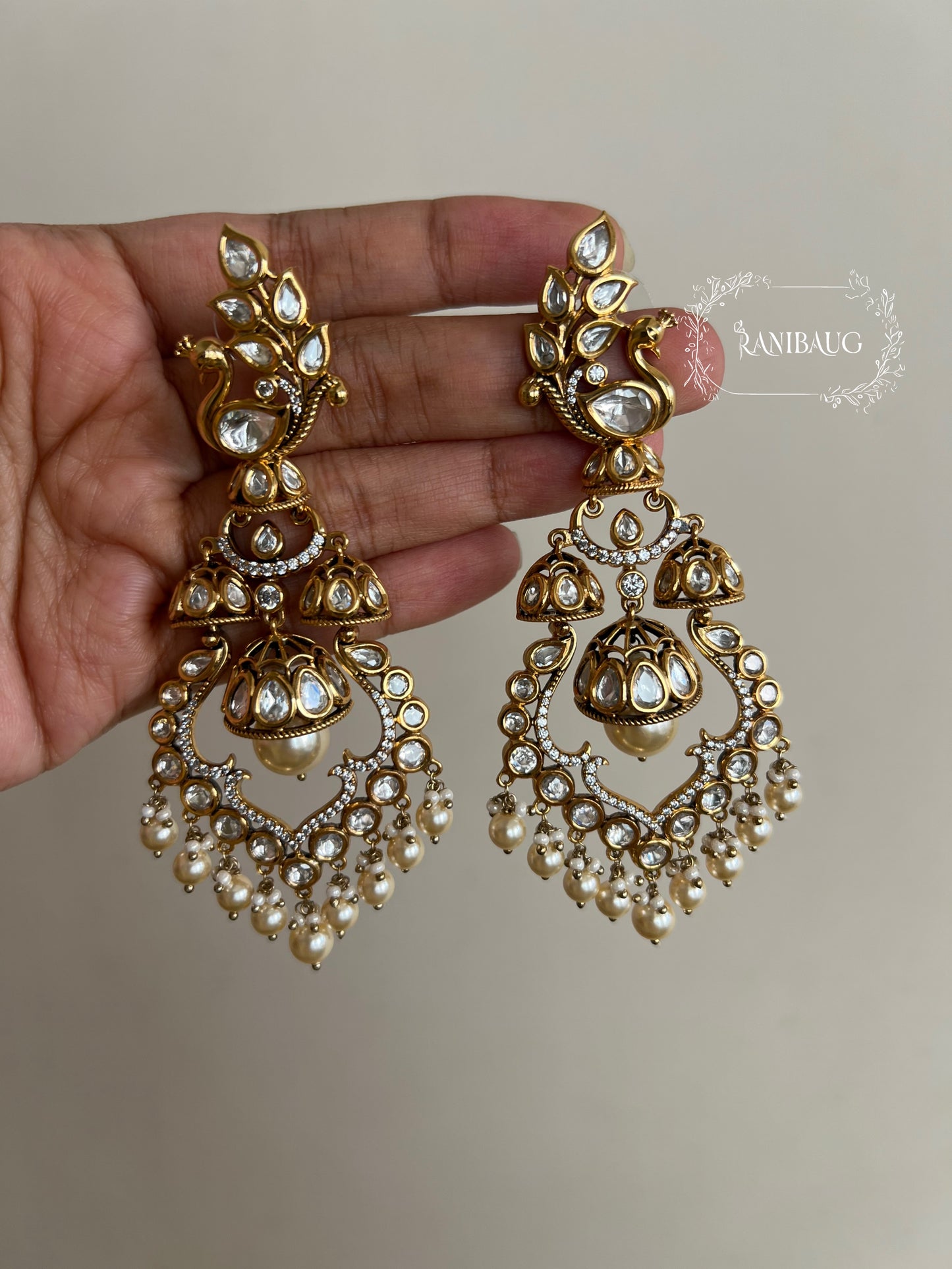 Tanushree Peacock Royal Designer Rich Gold Finish Mossainite Pearl Bridal Statement Earrings By Ranibaug | Best Bridal Earrings For 2026 Weddings