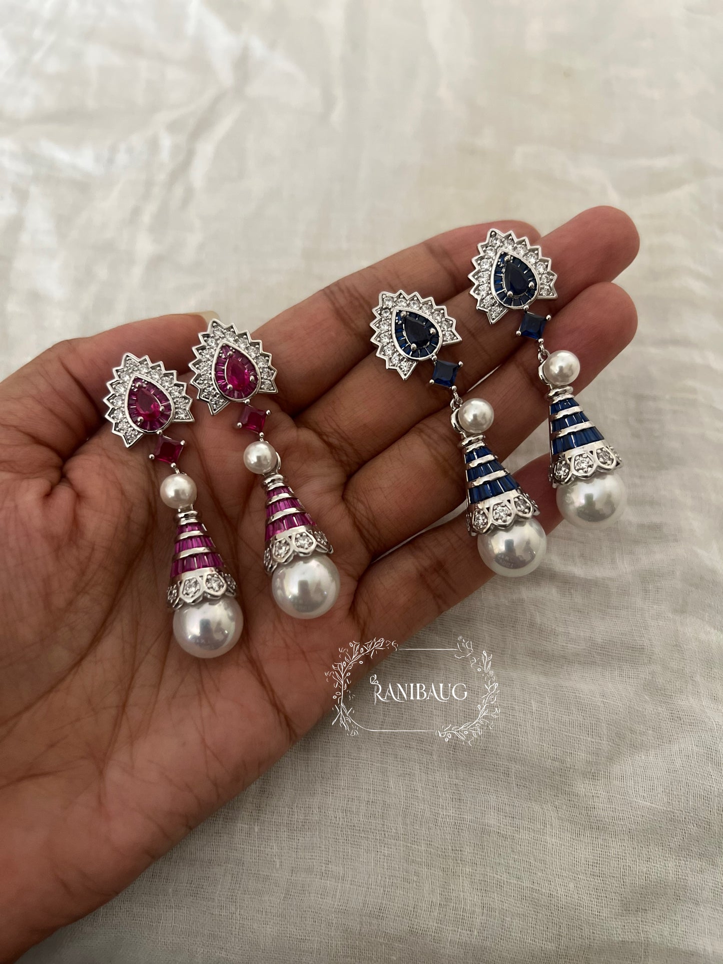 Tarika Diamond Gemstone Silver Finish Pearl Adorned Dangle Earrings By Ranibaug
