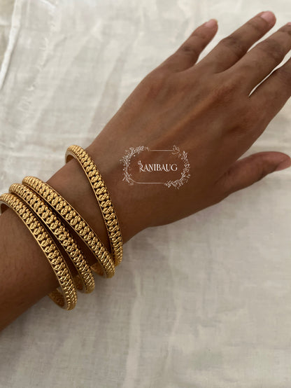 Tarini Classic Gold Finish Heritage Bangles Set Of Four By Ranibaug