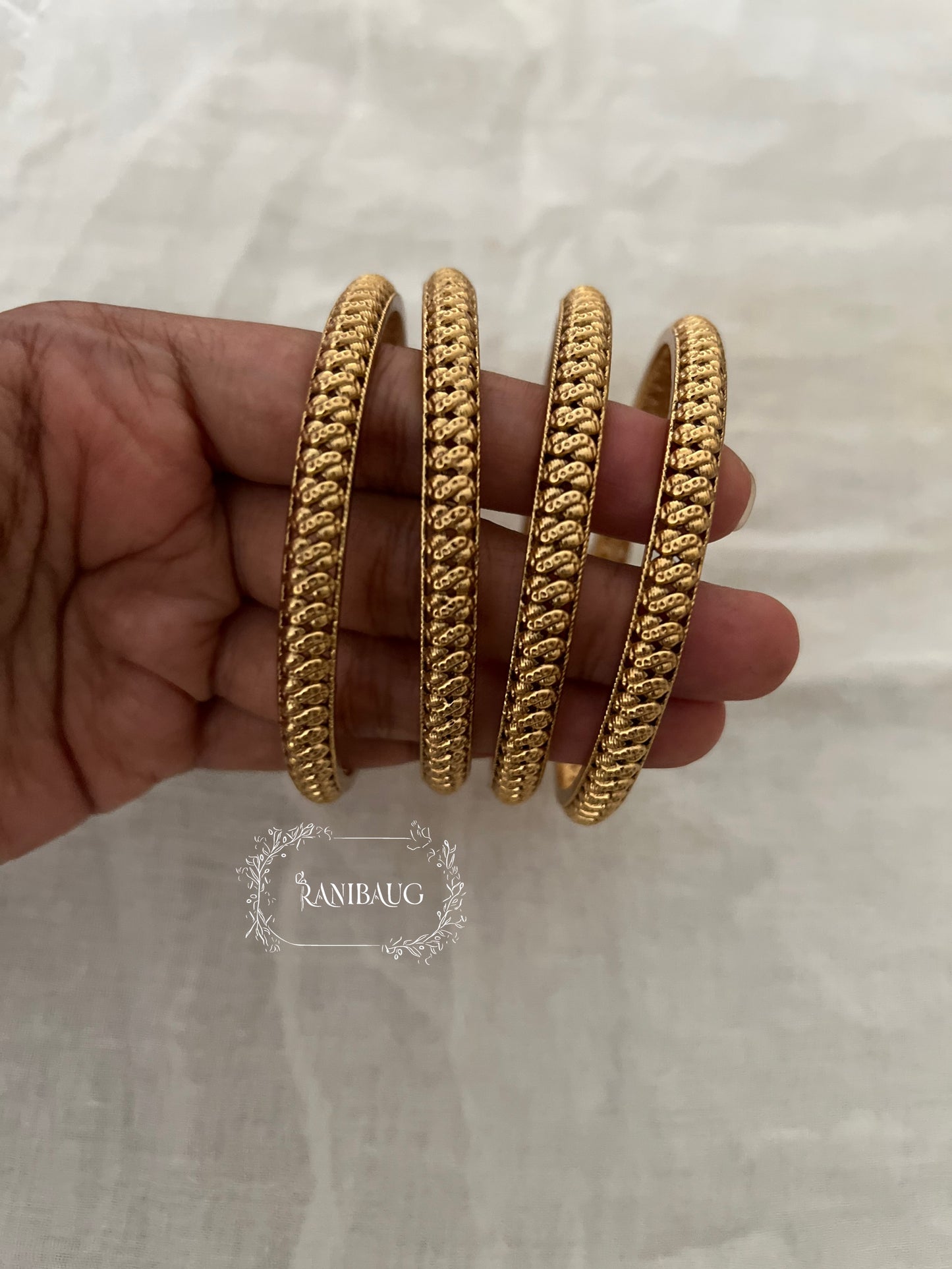 Tarini Classic Gold Finish Heritage Bangles Set Of Four By Ranibaug