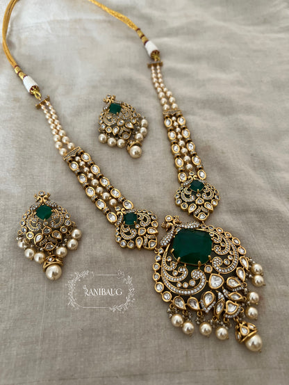 The Maharani’S Heirloom: Pearl Strand Necklace With Peacock Jadau Pendant | Emerald Green & Ruby Red Variants By Ranibaug