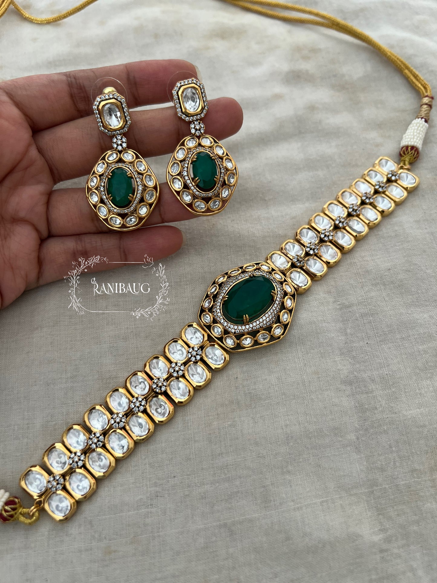 The Royal Sash Polki Choker Necklace Set | Ruby & Emerald Centerpiece In Rich Gold Finish By Ranibaug