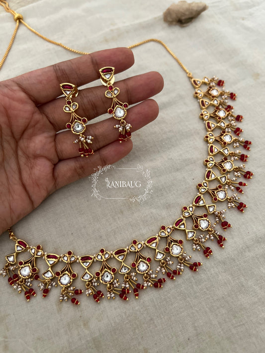 The Rukmini Rang-Mahal Polki Hourglass Necklace | Ruby & Emerald Geometric Fringe Set by Ranibaug