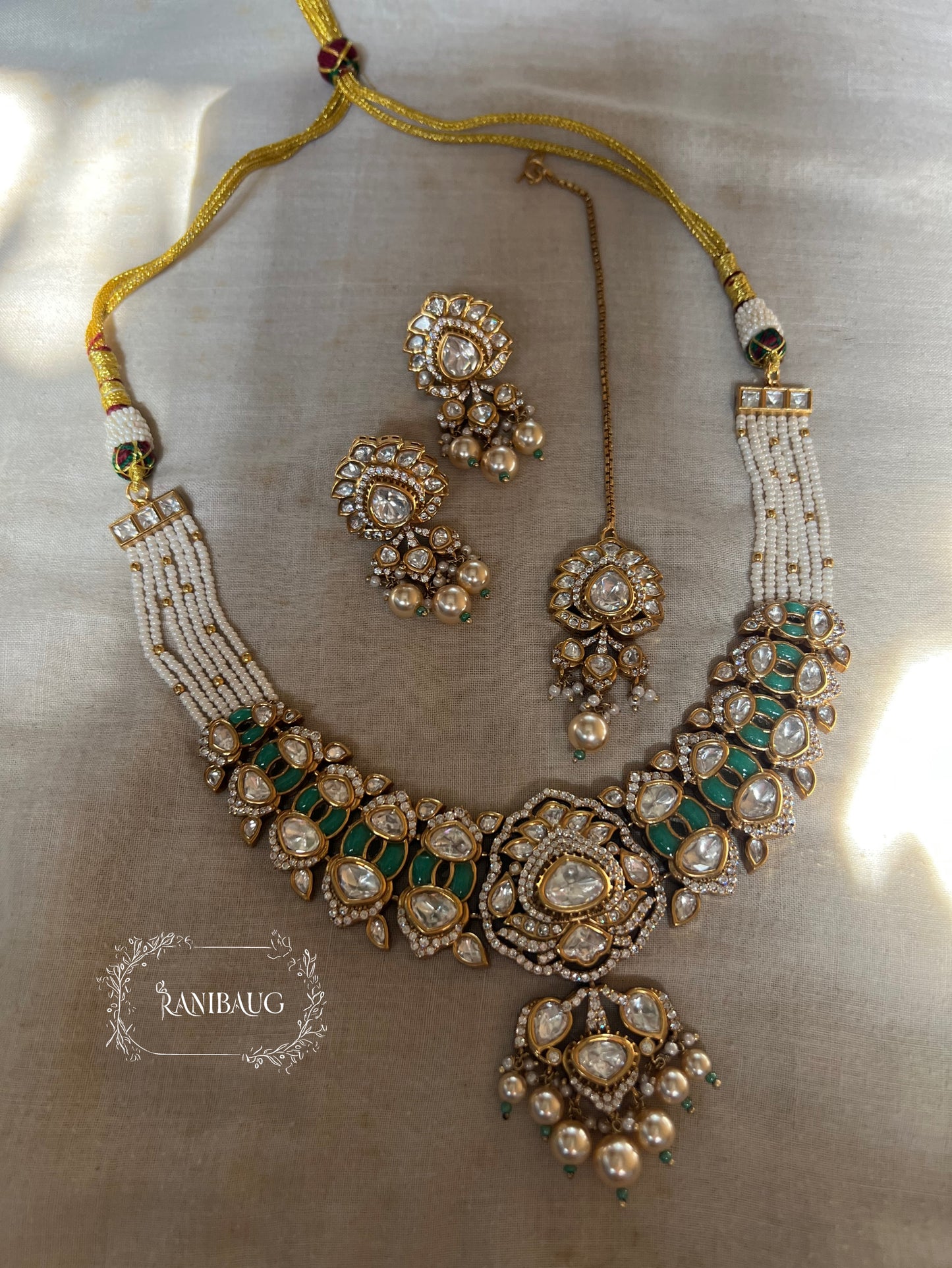 Tisha Rich Gold Finish Kundan And Pearl Enamel Festive Wear Jewellery Set By Ranibaug