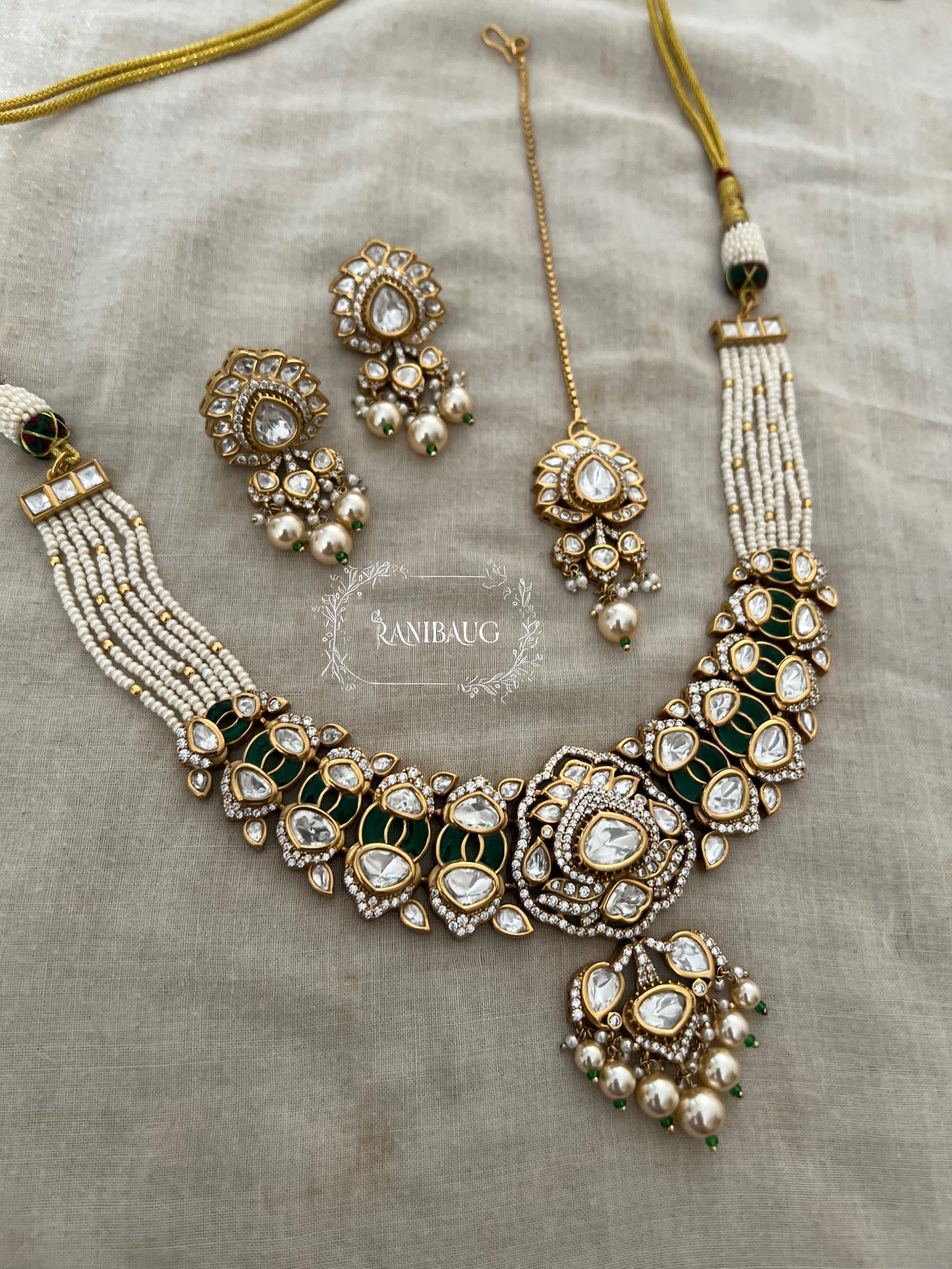 Tisha Rich Gold Finish Kundan And Pearl Enamel Festive Wear Jewellery Set By Ranibaug