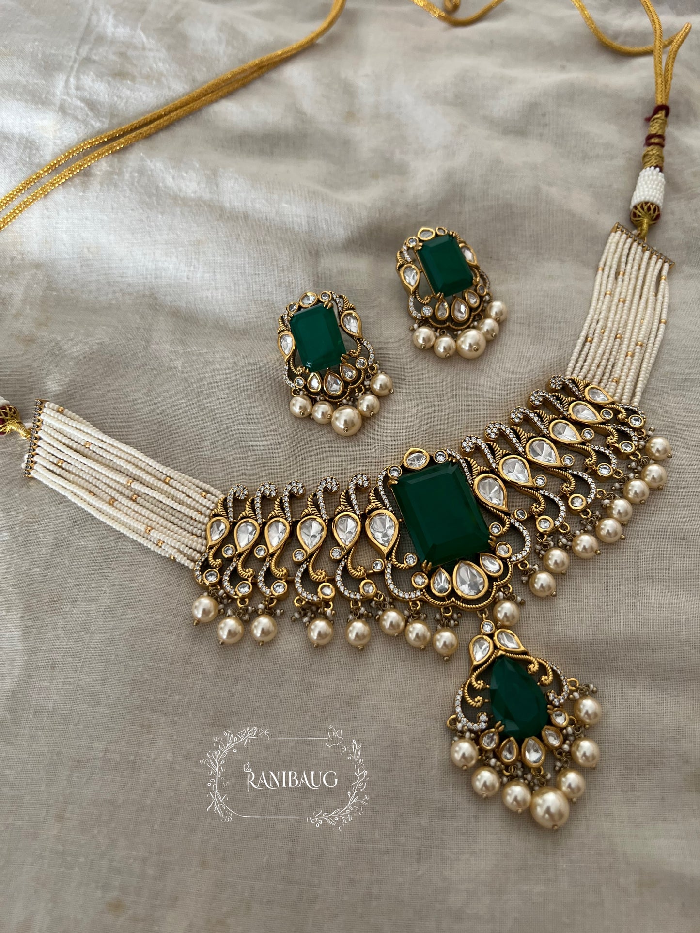 Trishna Emerald Stone And Polki Kundan Accents Multistrand Necklace Set For Women By Ranibaug For Special Occasions