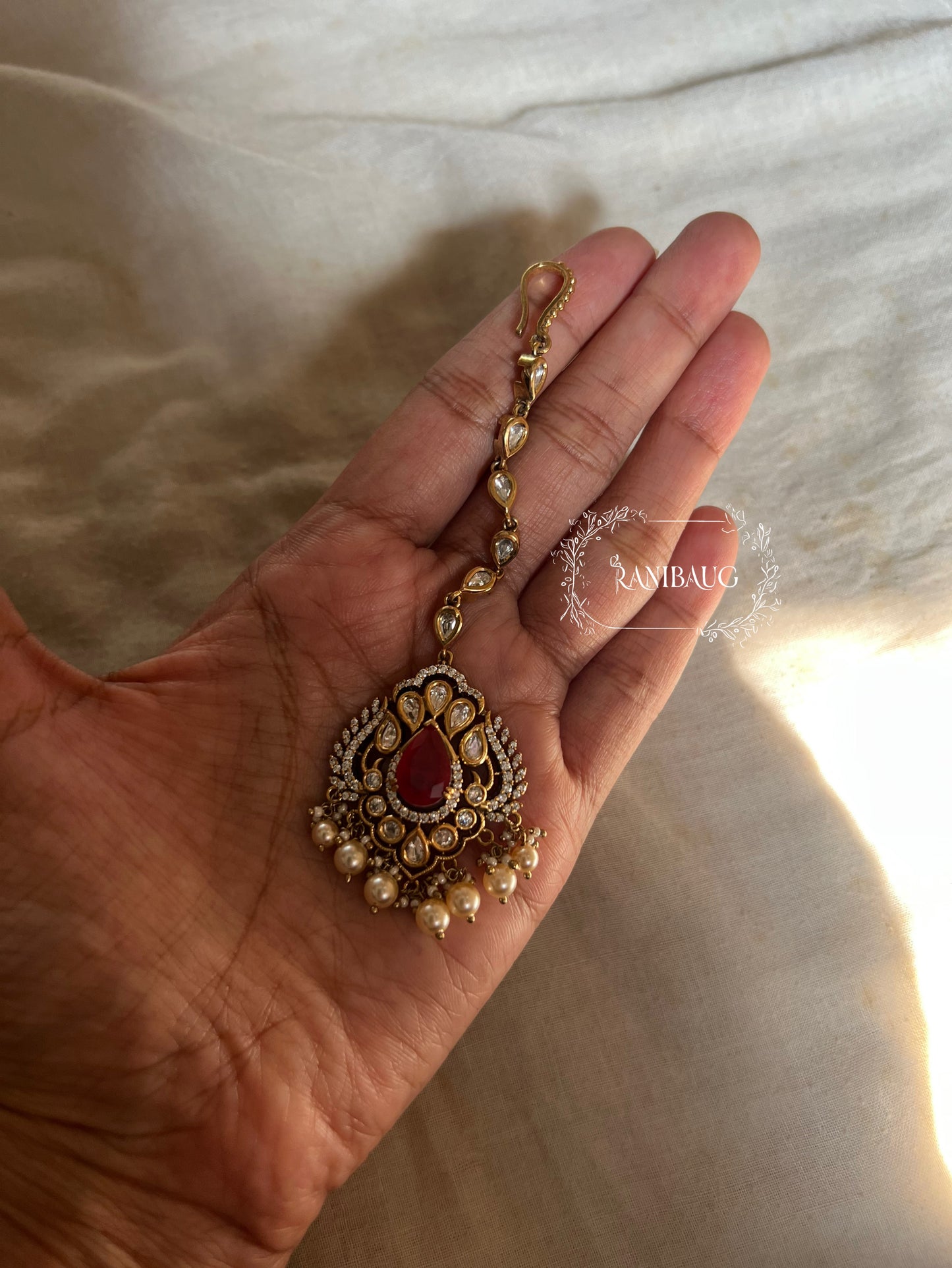 Vaani Antique Gold Victorian Finish Polki Gemstone Studded Maangtikka by Ranibaug