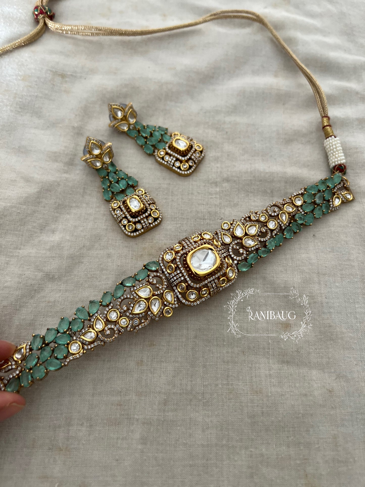 Vaidehi Mint And Gold Dual Tone Gemstone  And Polki Studded Designer Choker Set By Ranibaug