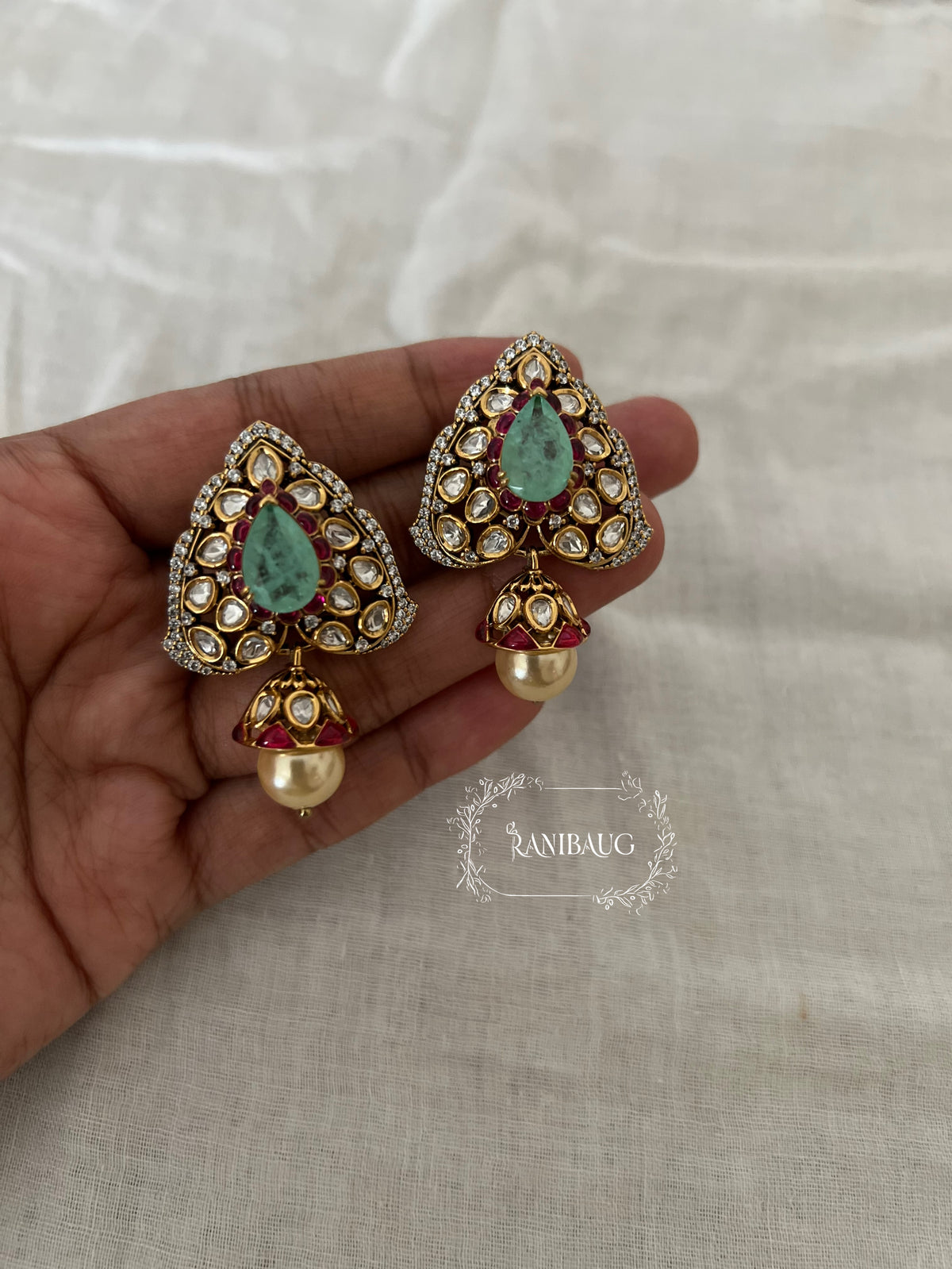 Vaidehi Triangular Polki Pearl Adorned Festive Ear Studs By Ranibaug